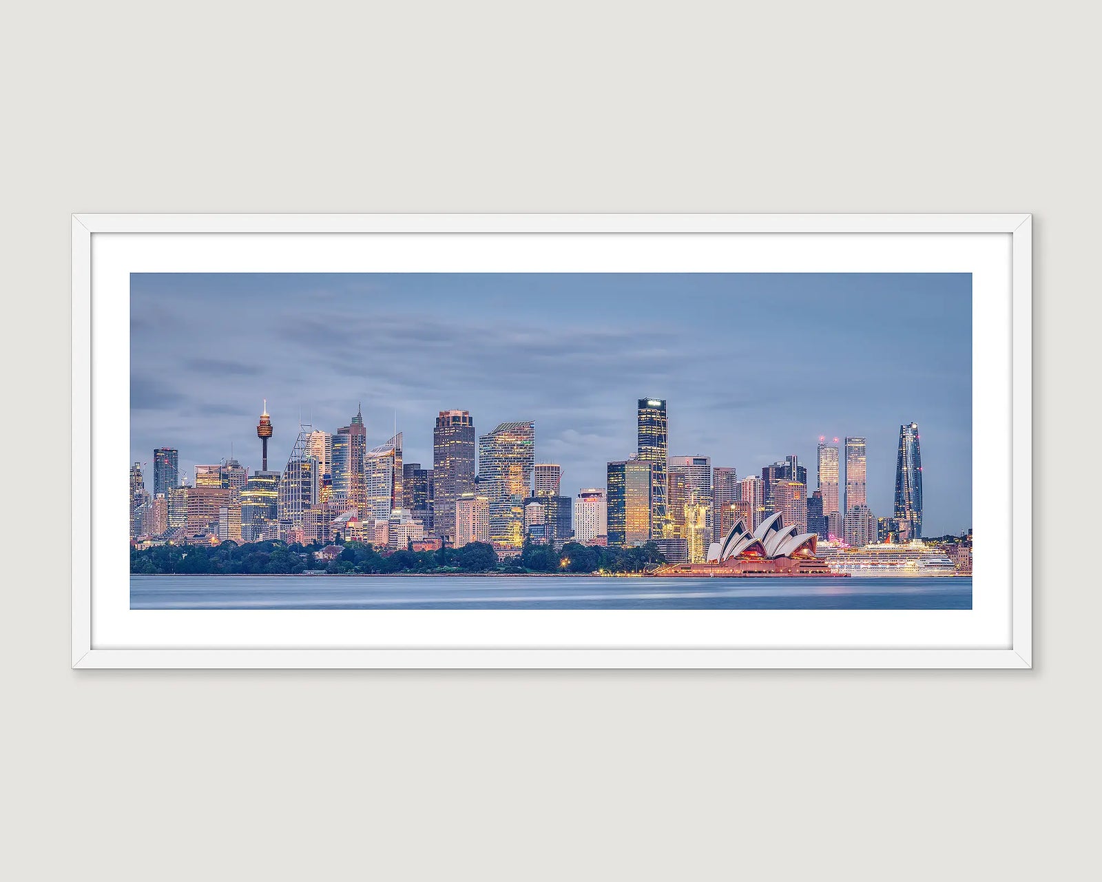 Framed photograph of Harbour views of the city of Sydney including the Opera House. 