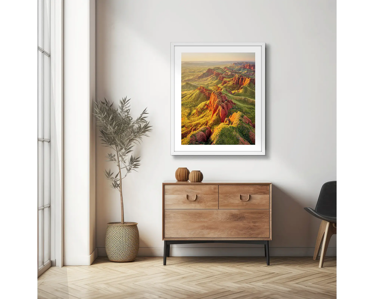 Classic Kimberley. Aerial photographic wall art print with a white frame, hung in a scandi hallway. 