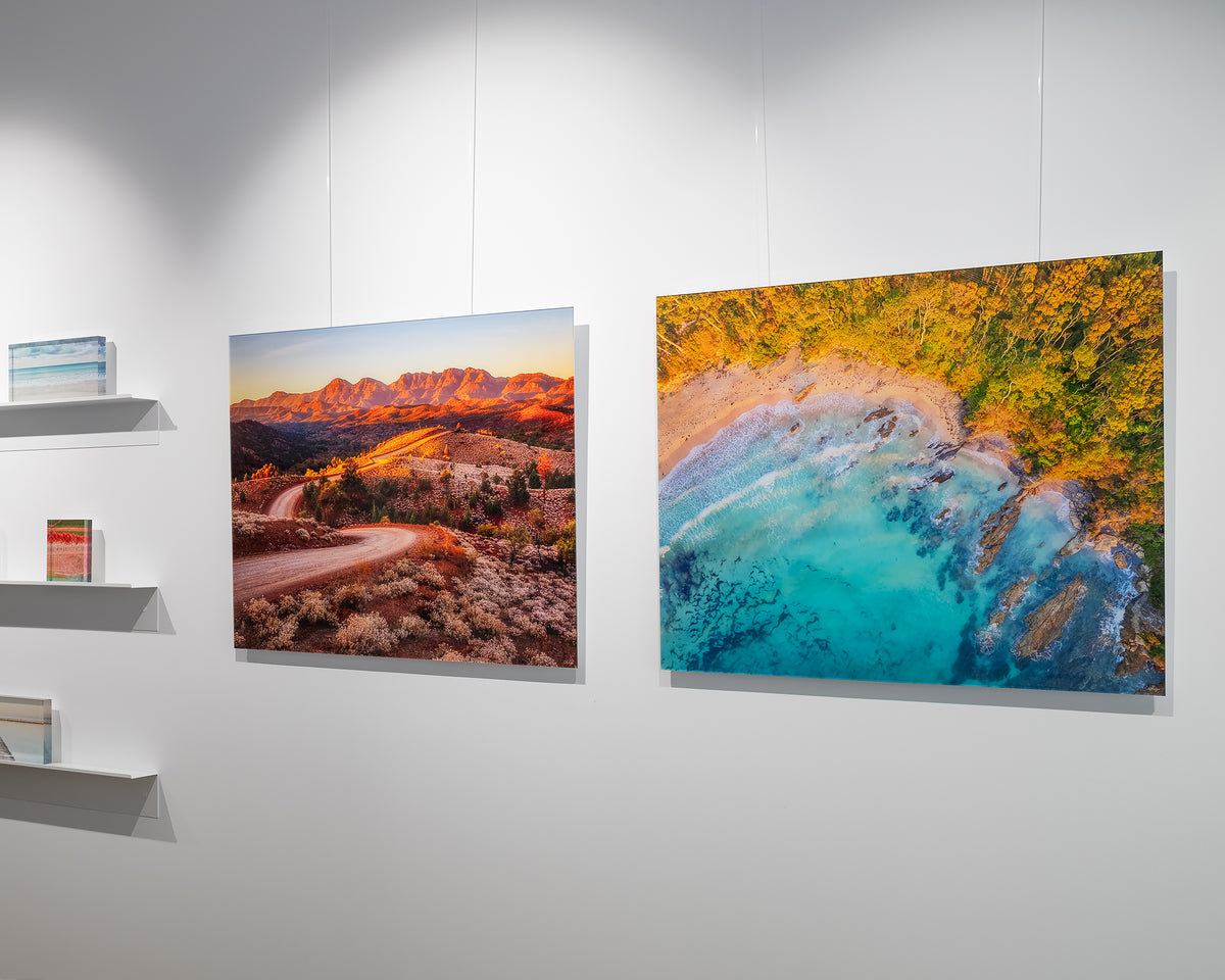 Coastal Bliss. New South Wales south coast aerial artwork frameless acrylic displayed in gallery.