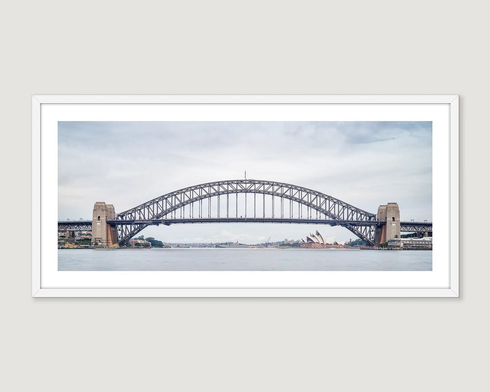 Framed photograph of Sydney Harbour Bridge and the Opera House. 