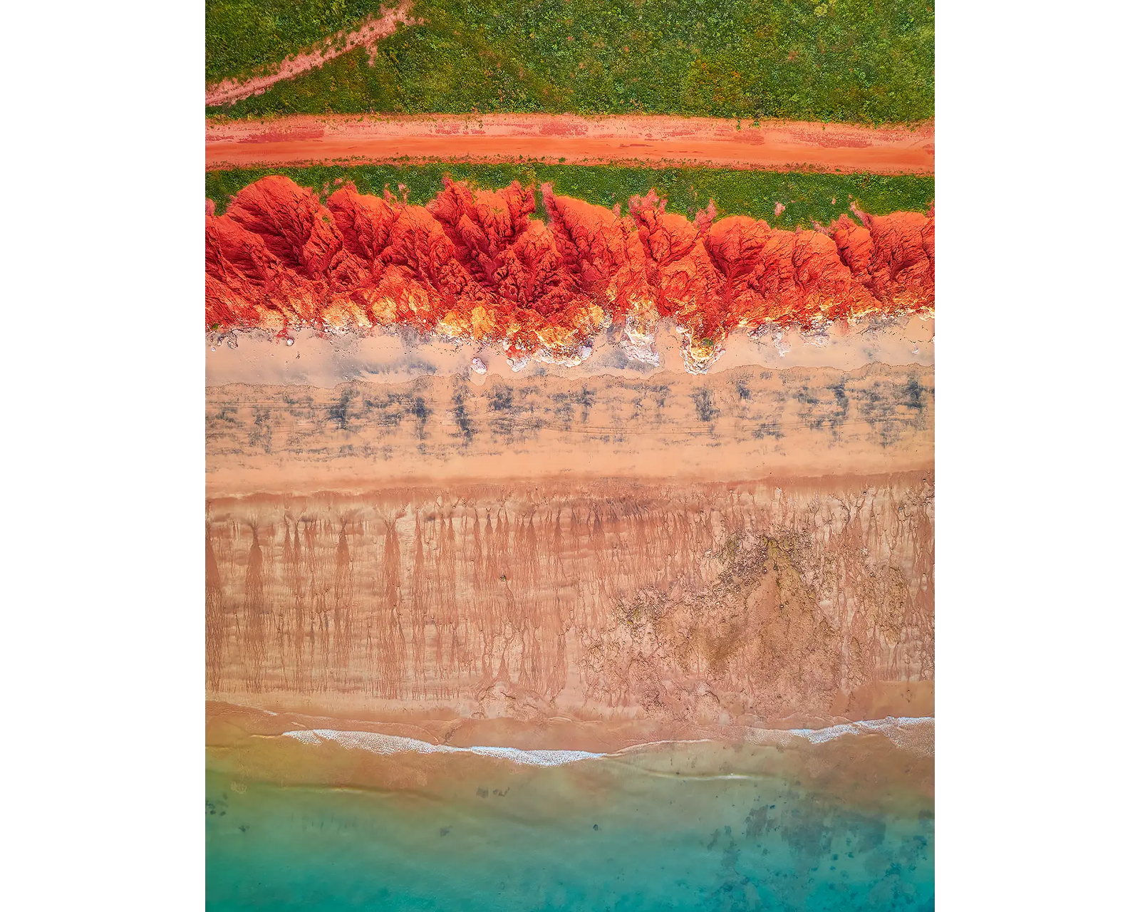 Coloured acrylic block. James Price Point, The Kimberley, aerial artwork sitting on desk.