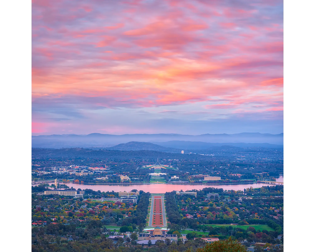 Pink clouds over Canberra at sunrise.