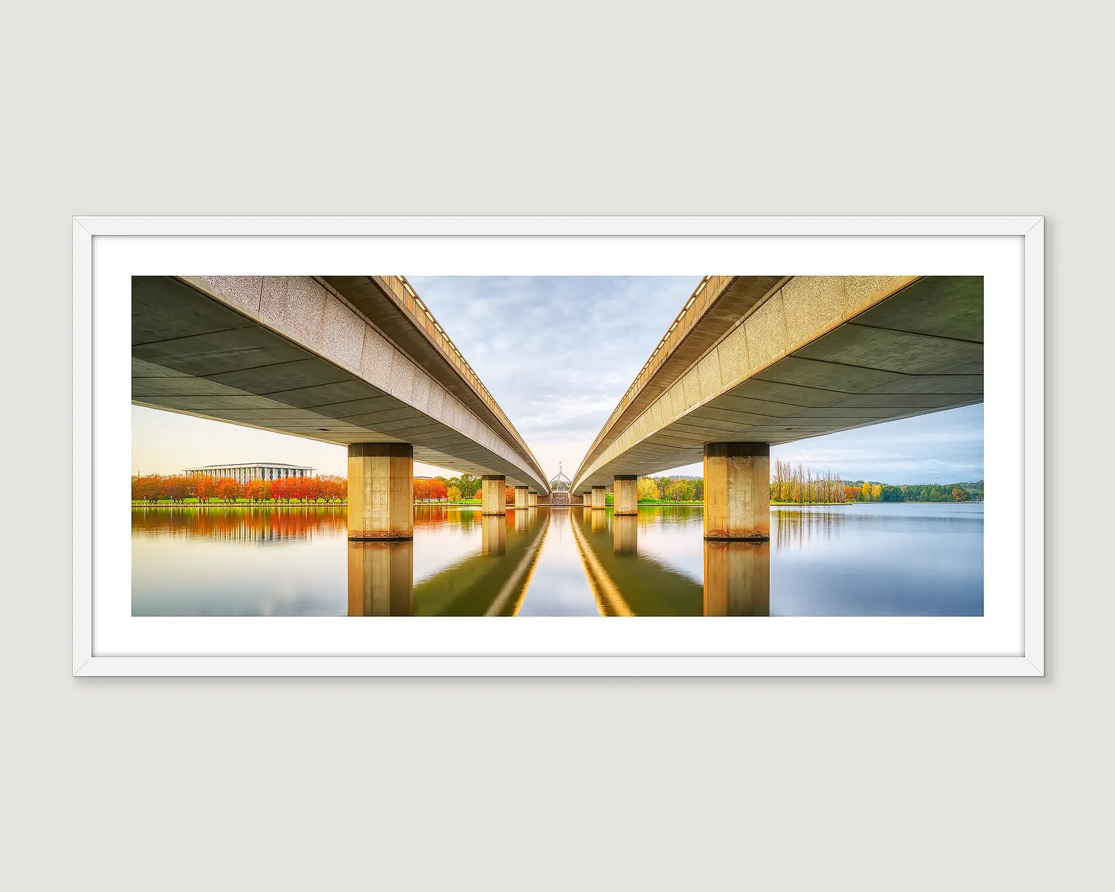 Framed photograph of Commonwealth Avenue Bridge with views to Parliament House, and the National Library. 