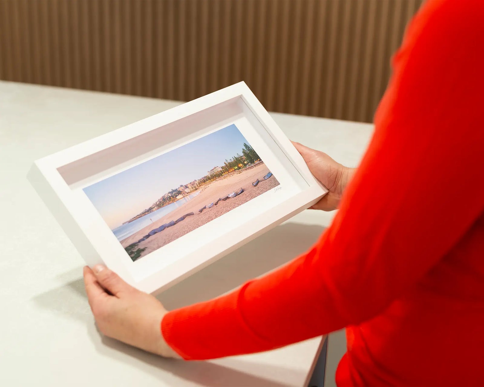 Framed photograph of an early morning on Sydney's Coogee Beach. 