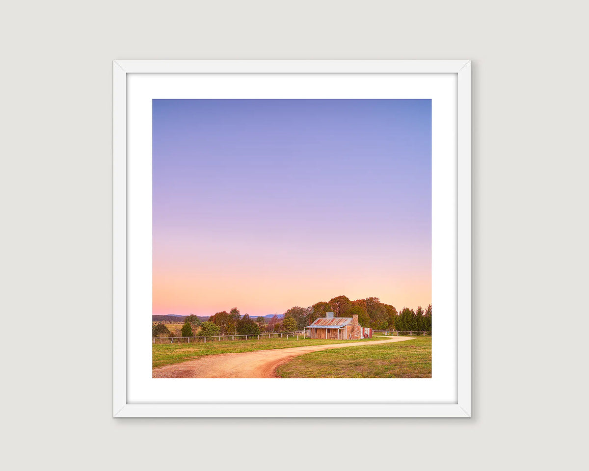 Framed artwork of a rural cottage at sunset at Bundgendore. 