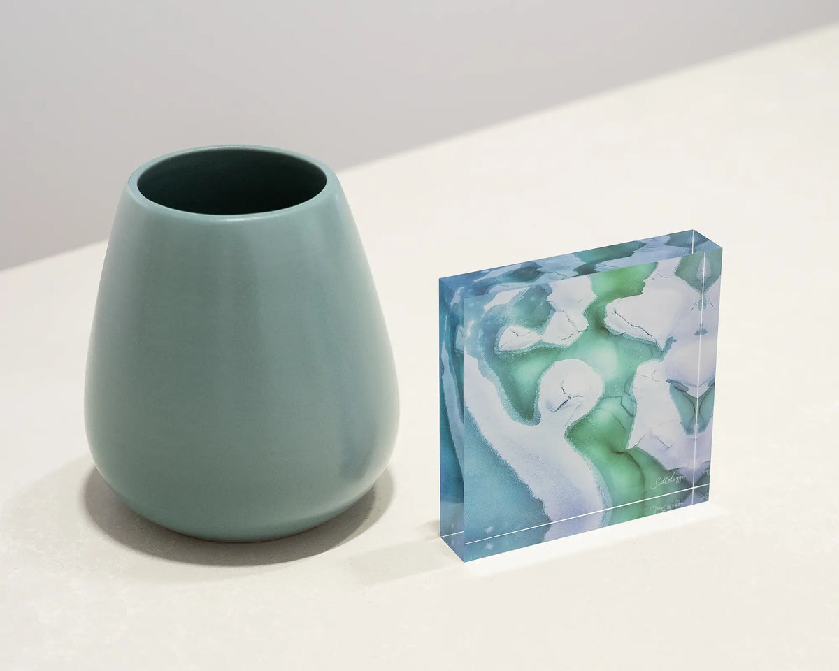 Cracked. Abstract acrylic block snow and ice Snowy River, Kosciuszko National Park, styled with small vase.