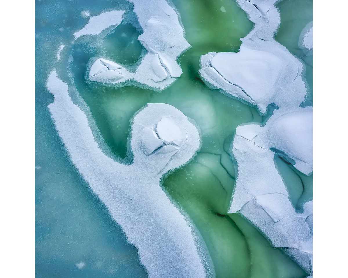 Aerial view of snow and ice on the Snowy River, Kosciuszko National Park.