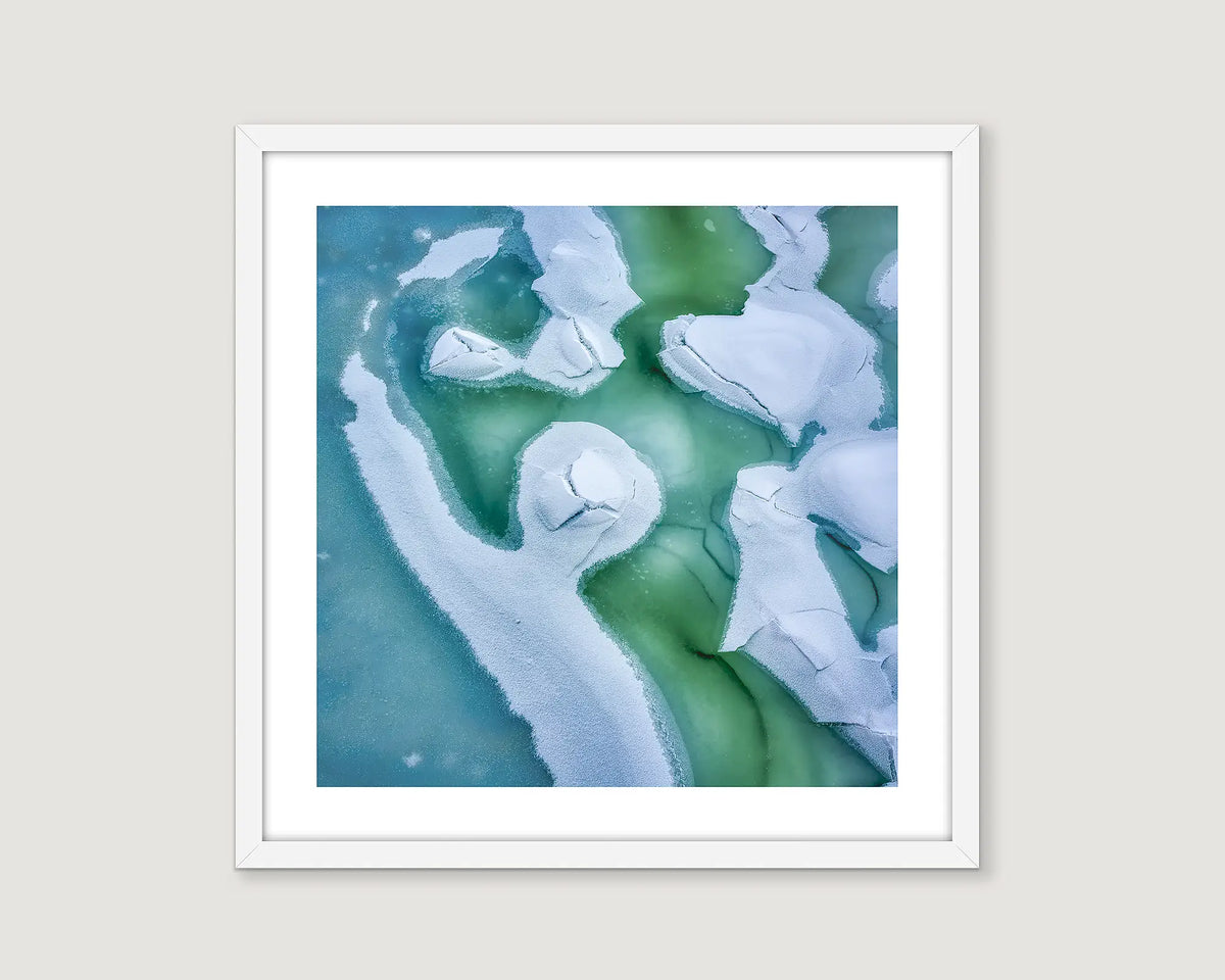 Framed abstract photograph of snow and ice formations on the Snowy River. 