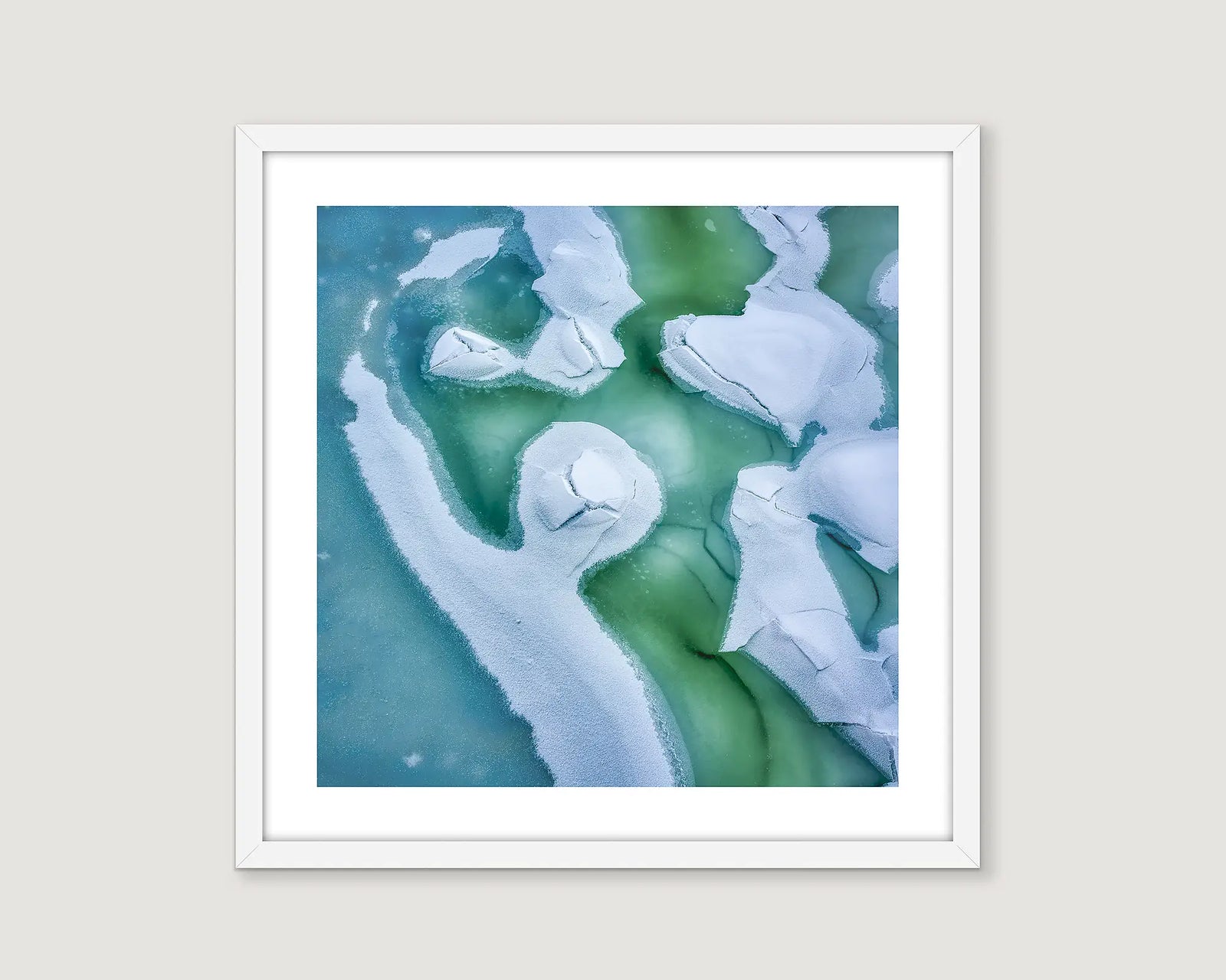 Framed abstract photograph of snow and ice formations on the Snowy River. 