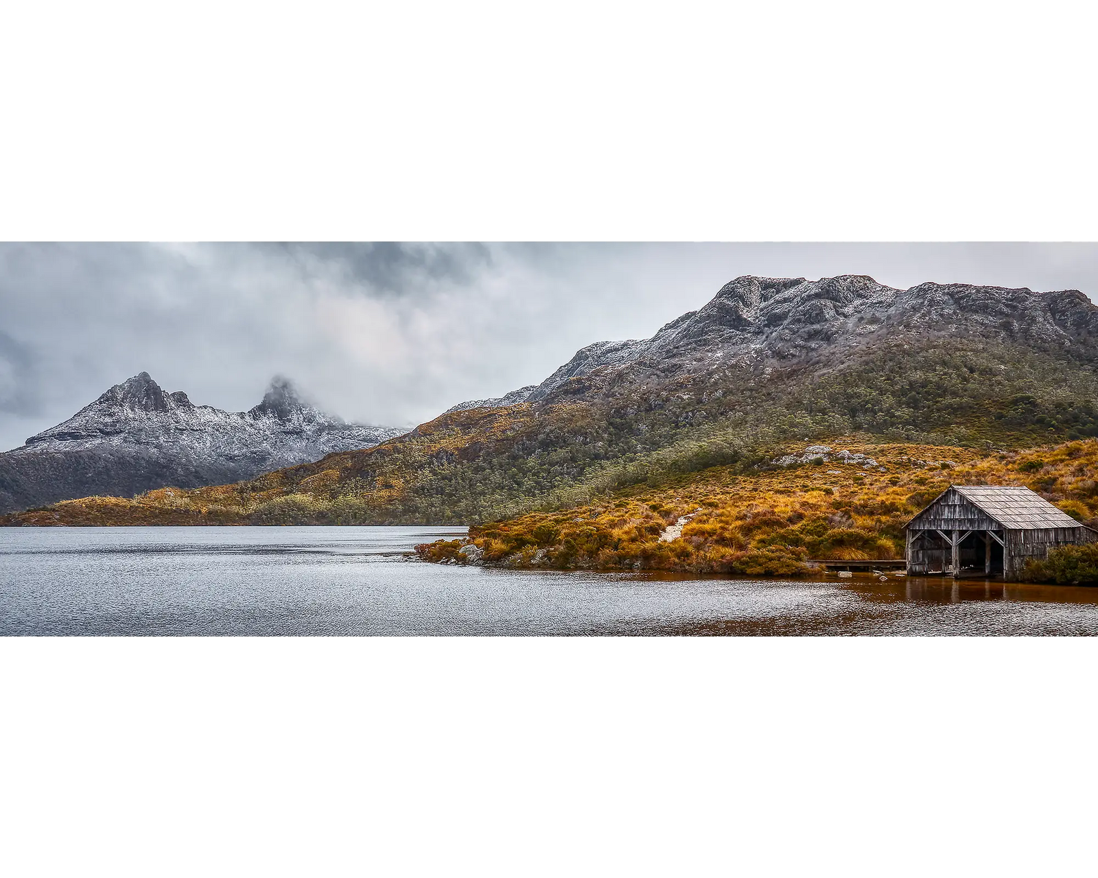 Cradle Mountain surrounded by fog in Lake St Clair National Park, Tasmania. 