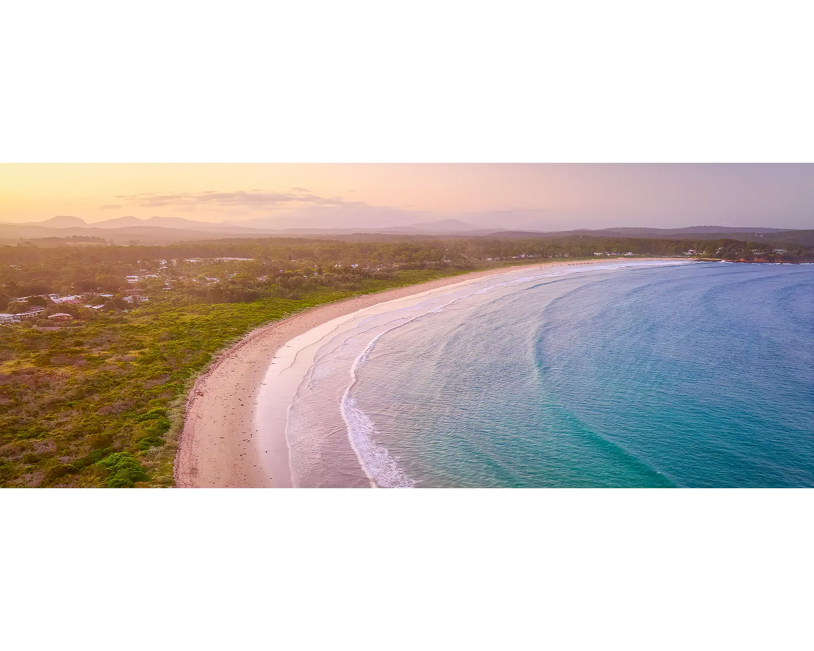 Curvature. Sunset at Broulee Beach, South Coast, New South Wales.