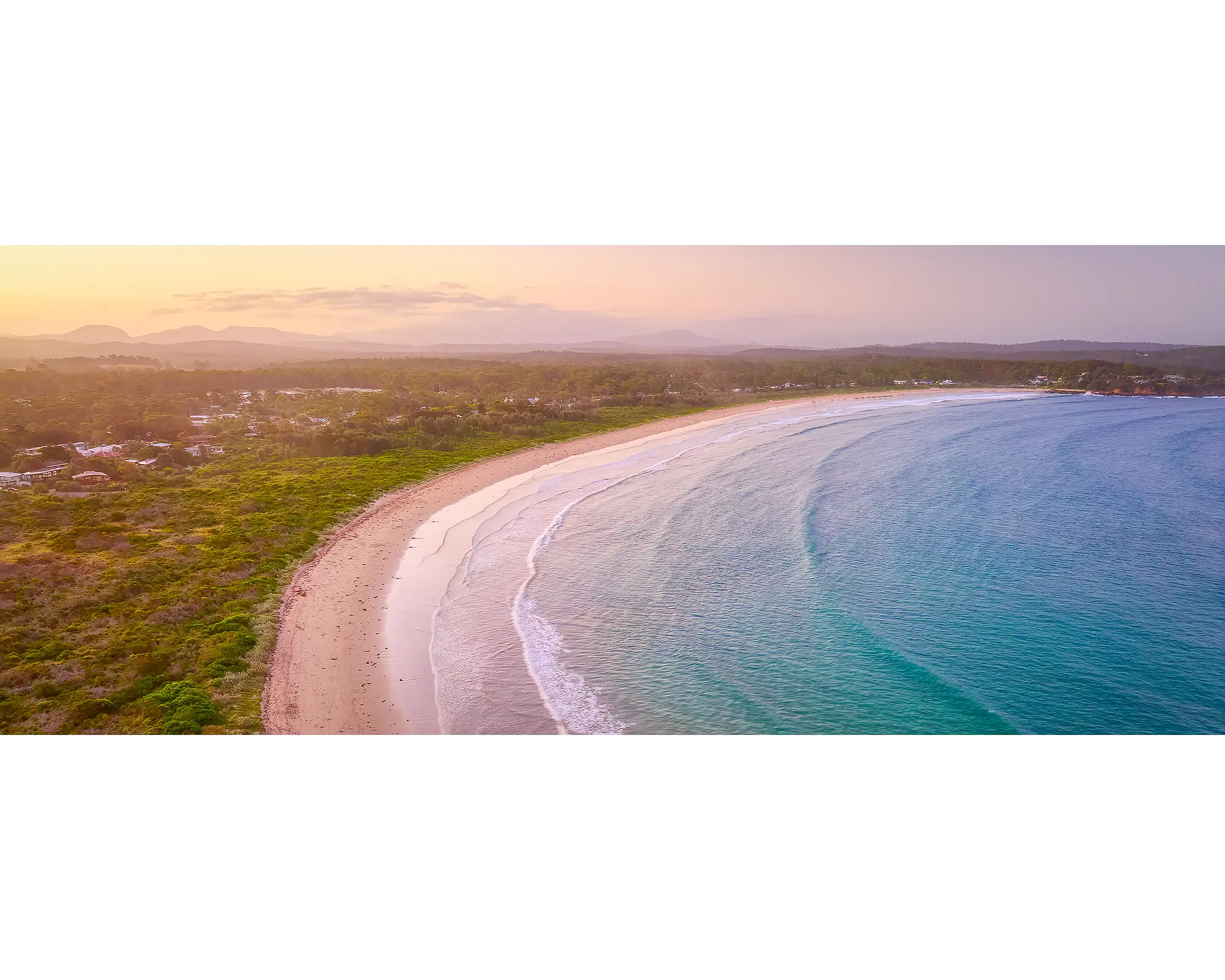 Curvature. Sunset at Broulee Beach, South Coast, New South Wales.