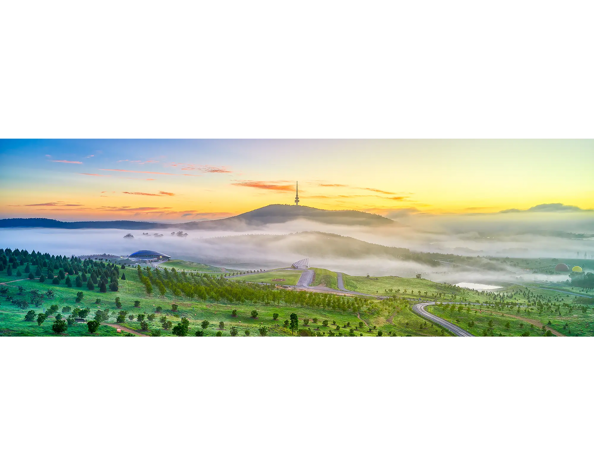 Dawn At The Arboretum. Early morning fog lingering over the National Arboretum, Canberra.