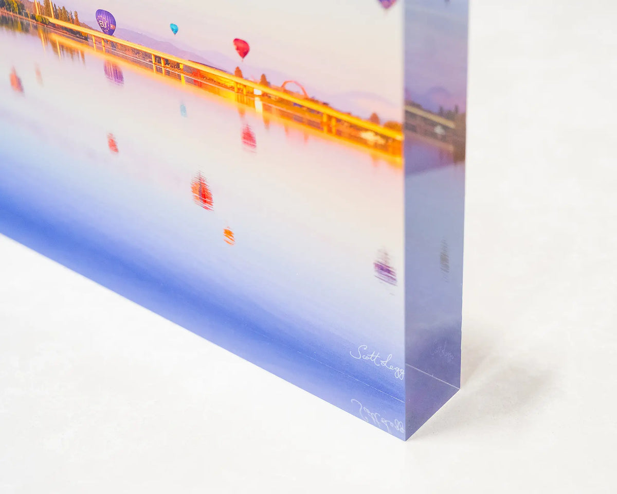 Dawn Drifters. Acrylic block of hot air balloons over Lake Burley Griffin Canberra, corner close-up details.