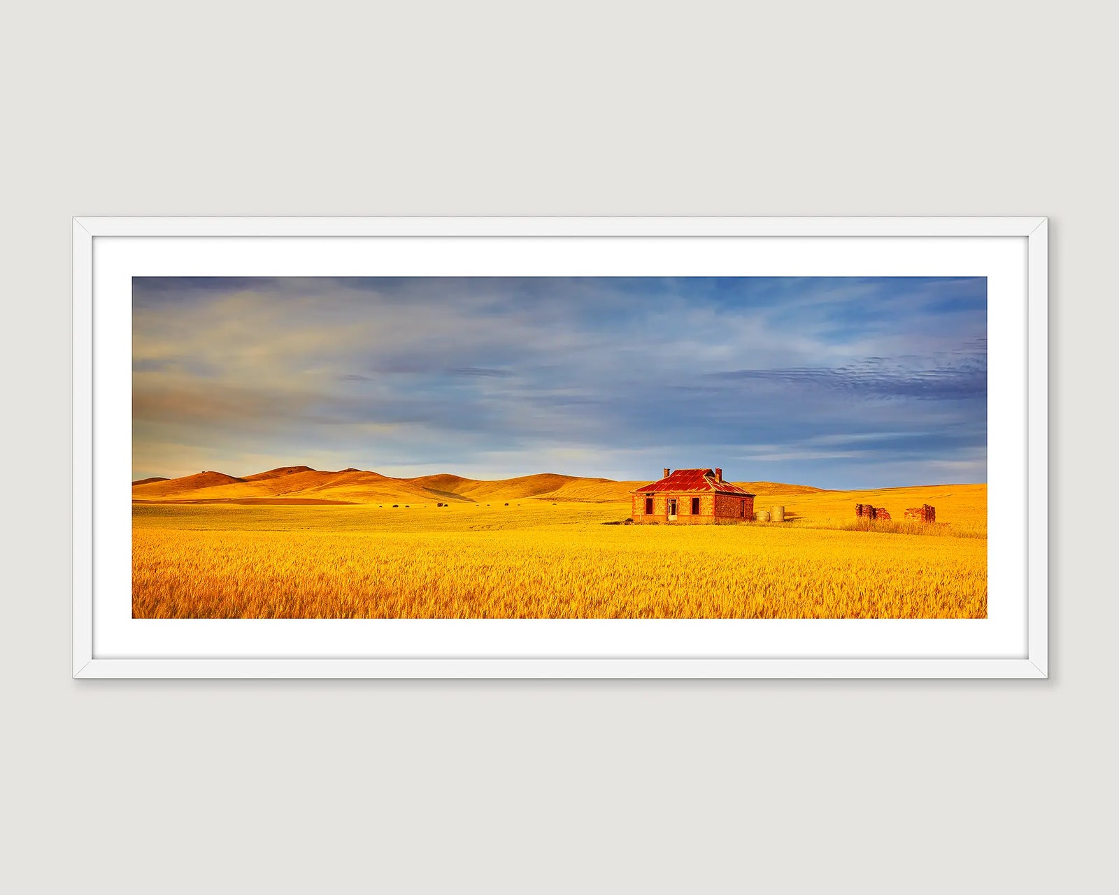 Framed photographic wall art print of an abandoned farmhouse in a wheat field at Burra, South Australia. 
