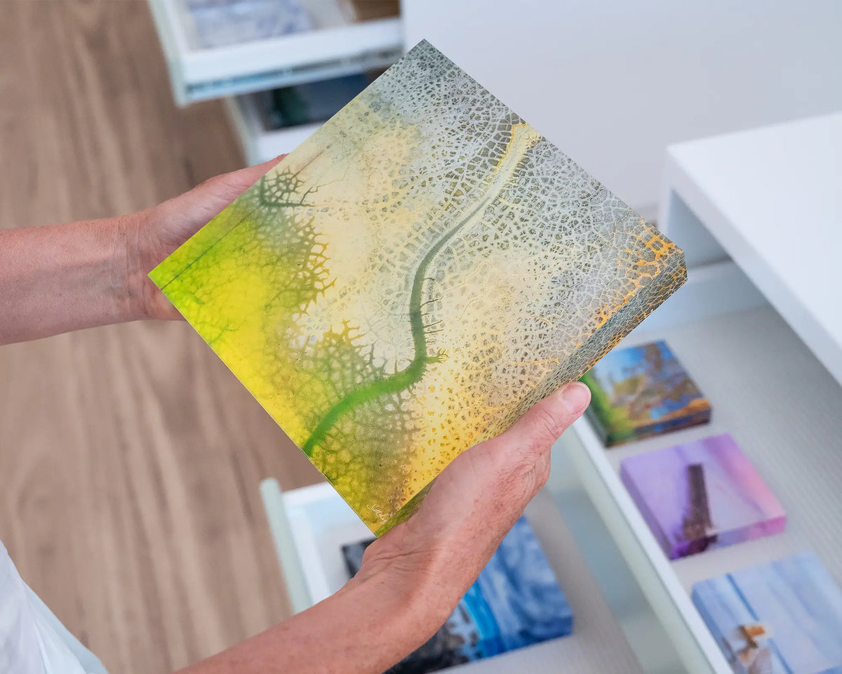 Dehydration. Acrylic block abstract aerial image of a dried dam New South Wales, hand held in gallery.