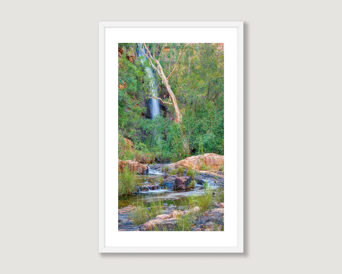 Framed artwork of a waterfall in El Questro,  on a white background.