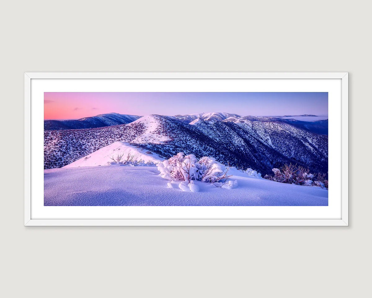 Framed photograph of a sunrise reflecting in the snow, on the Razorback, Alpine National Park. 