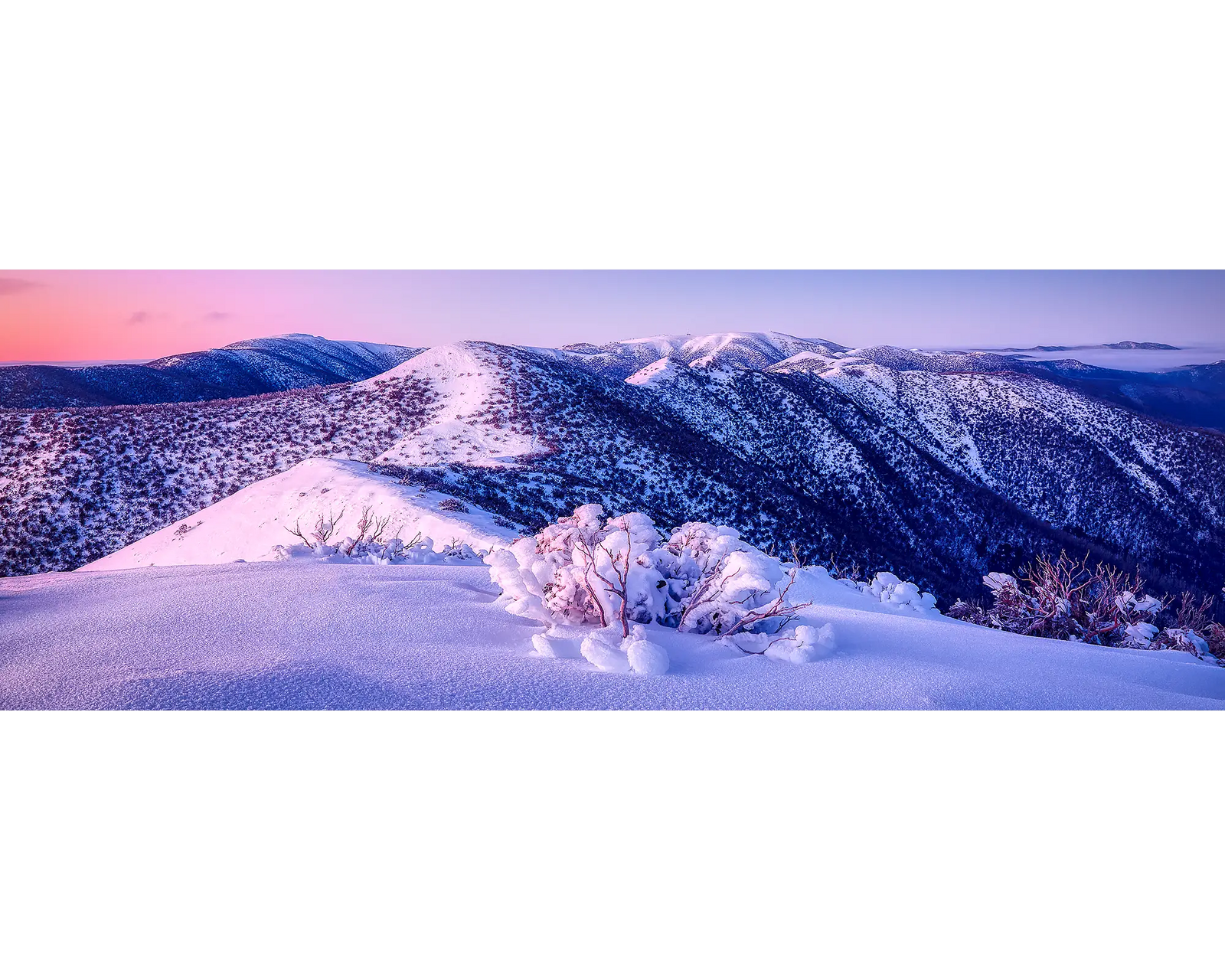 Sunrise over the Razorback with snow in winter, Alpine National Park, Victoria.
