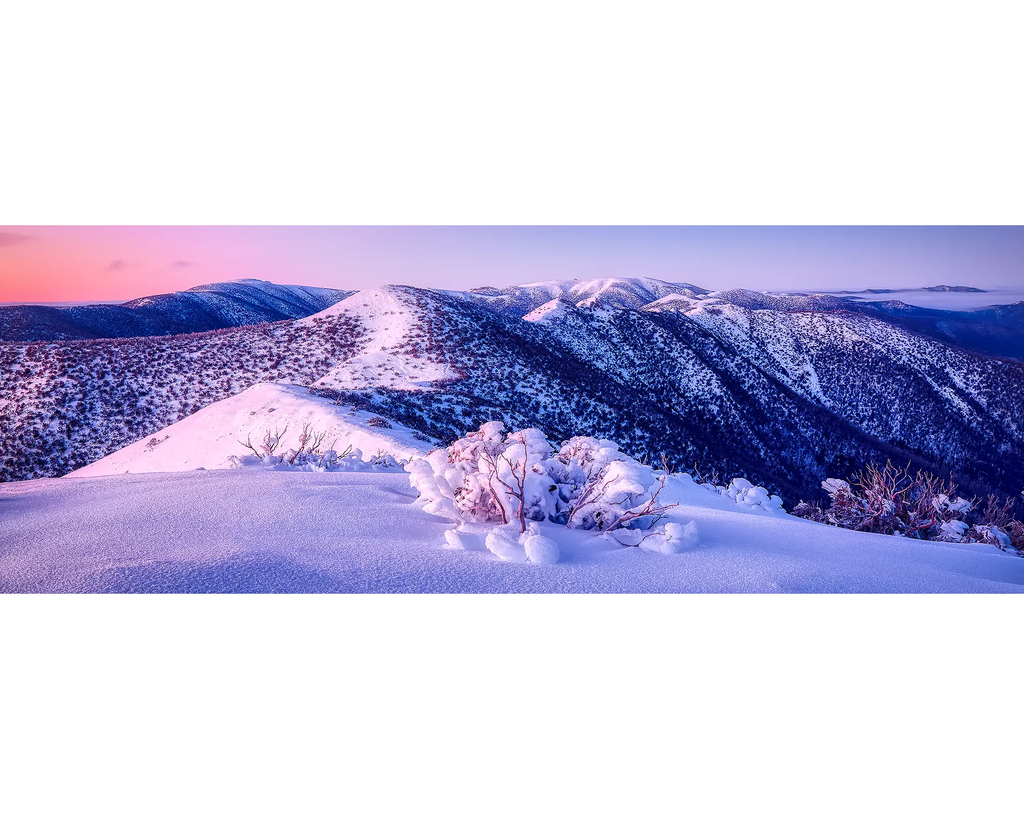 Sunrise over the Razorback with snow in winter, Alpine National Park, Victoria.