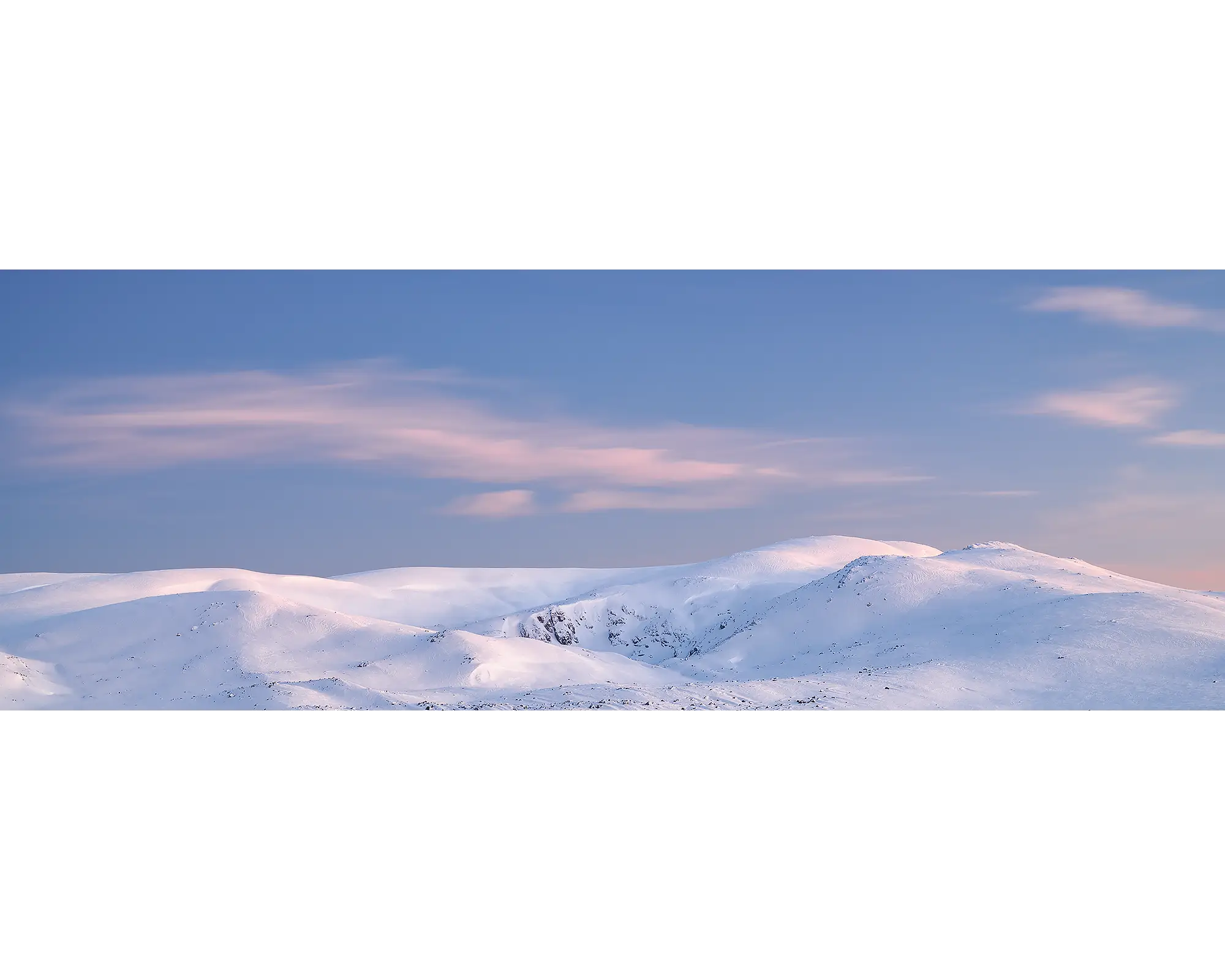 Sunrise over snow covered Mount Twynam and Blue Lake Kosciuszko National Park, NSW. 