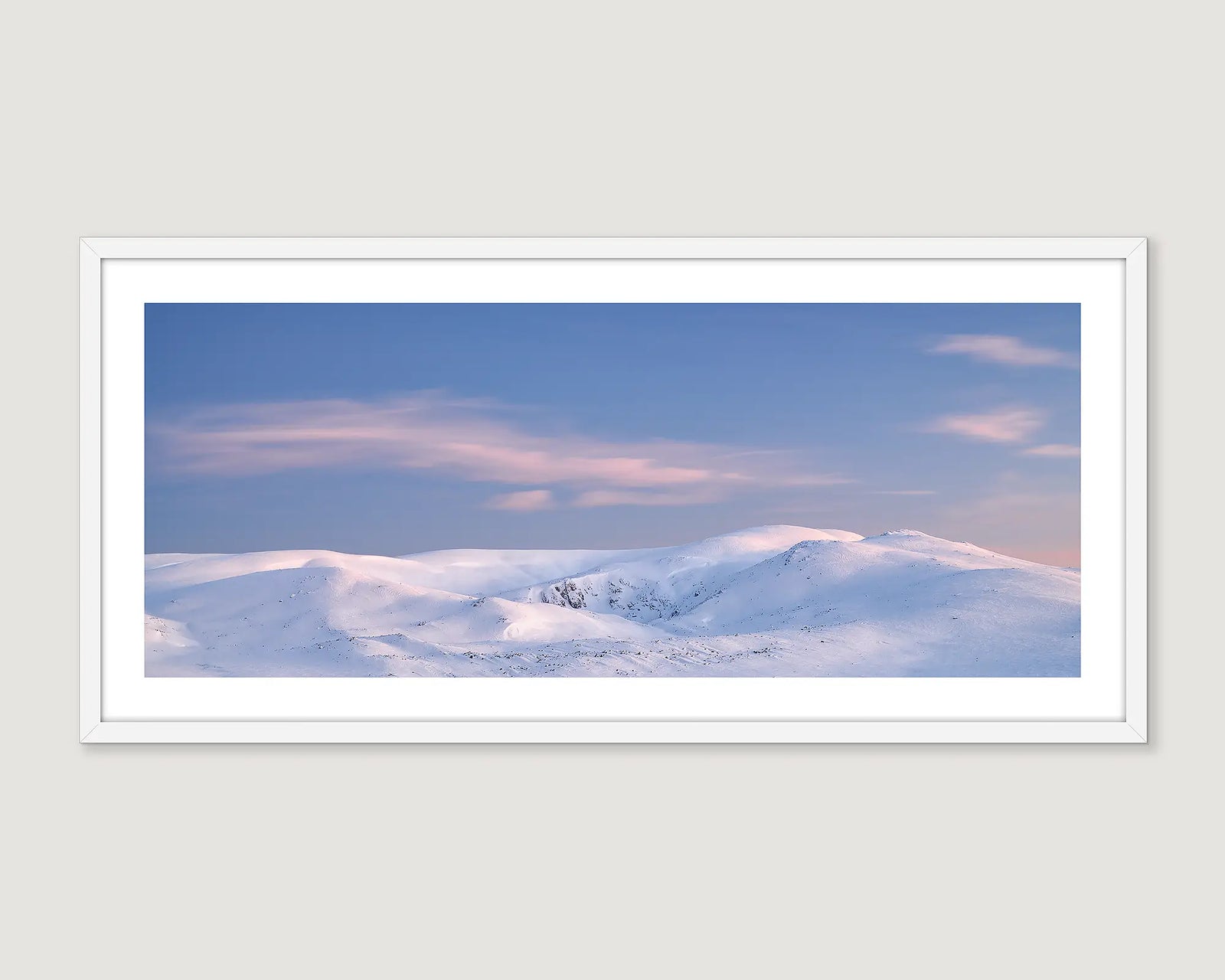 Framed wall art print of a sunrise over Mount Twynam and Blue Lake, covered in snow. 