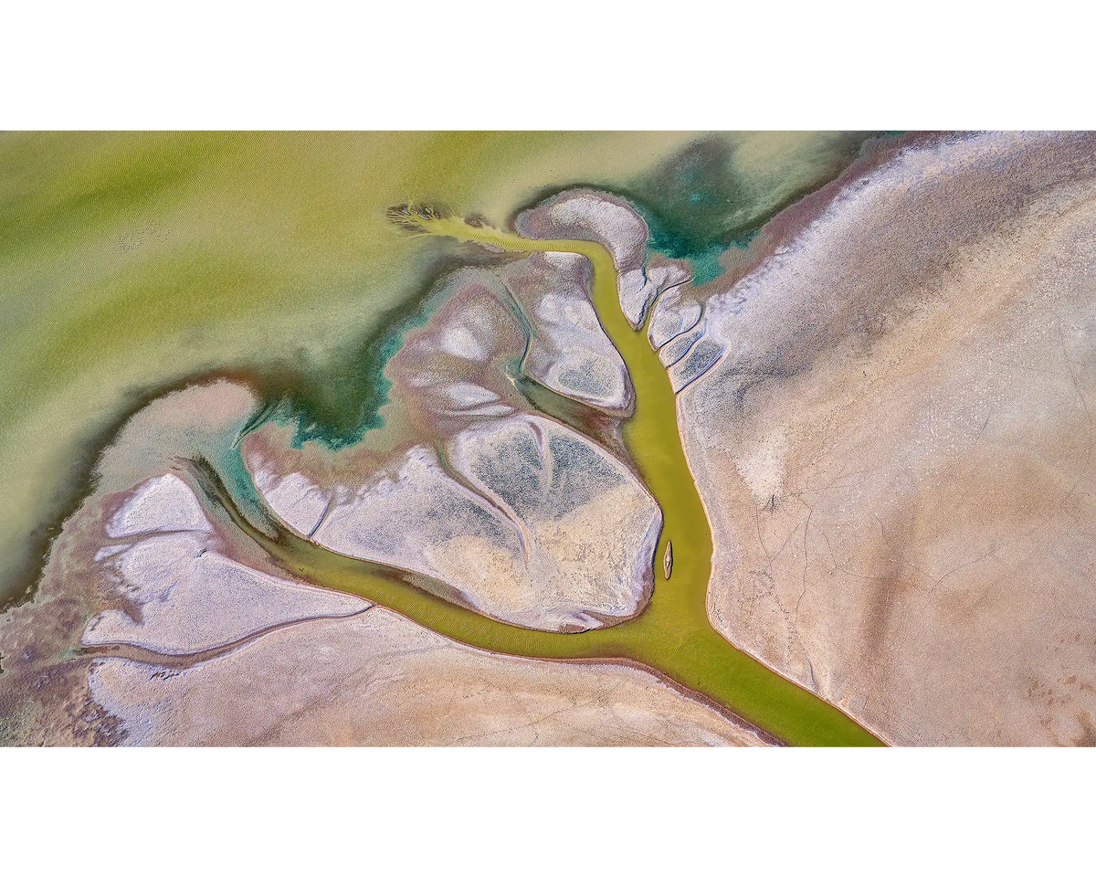 Embrace. Water flowing our from King River, The Kimberley, Western Australia.