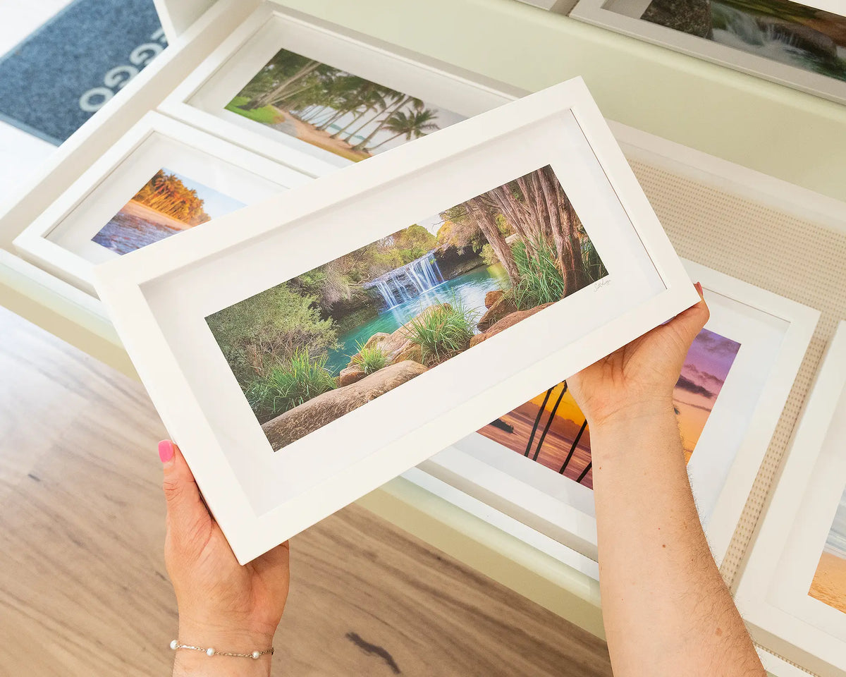 Emerge. Waterfall Budderoo National Park, Southern Highlands, with white frame being hand held.