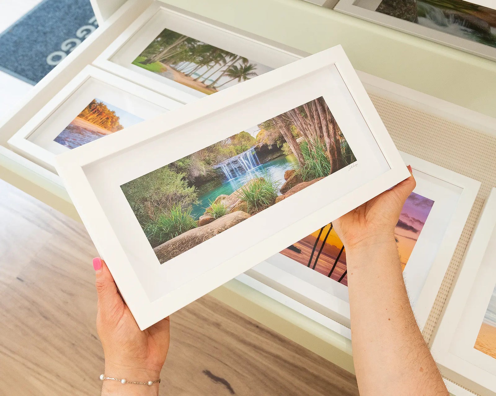 Framed wall art print of a waterfall and rock pool in the Budderoo National Park. 
