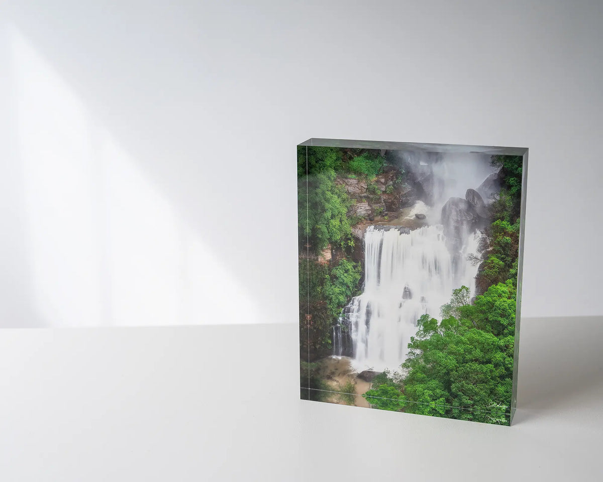 Energy. Acrylic block of Fitzroy Falls, Morton National Park, on desk with soft window light.