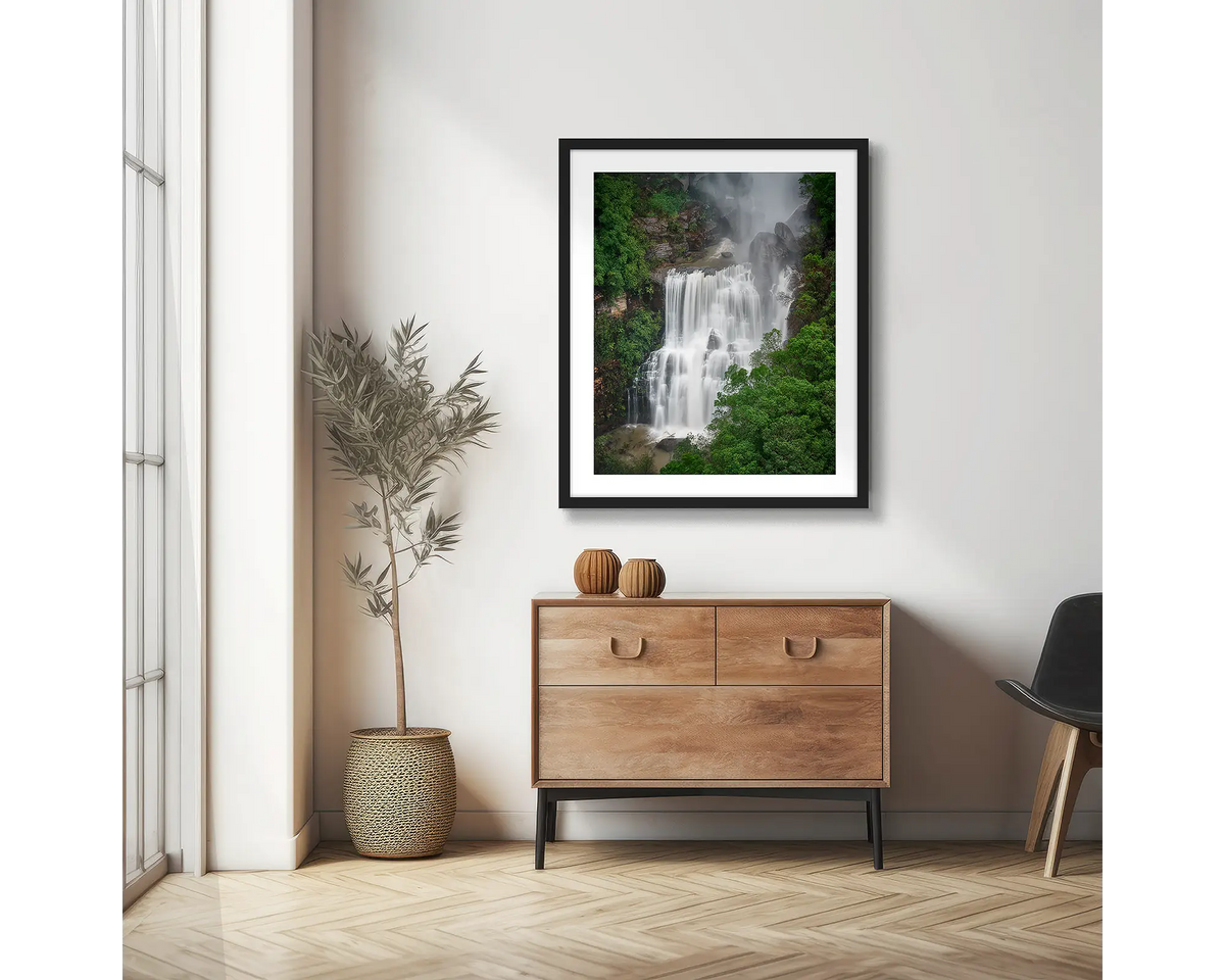 Energy. Fitzroy Falls photographic wall art print with a black frame, hung in a scandi hallway. 