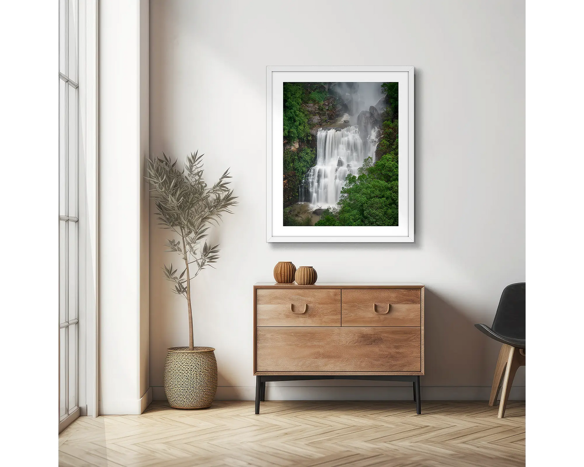Energy. Fitzroy Falls photographic wall art print with a white frame, hung in a scandi hallway. 