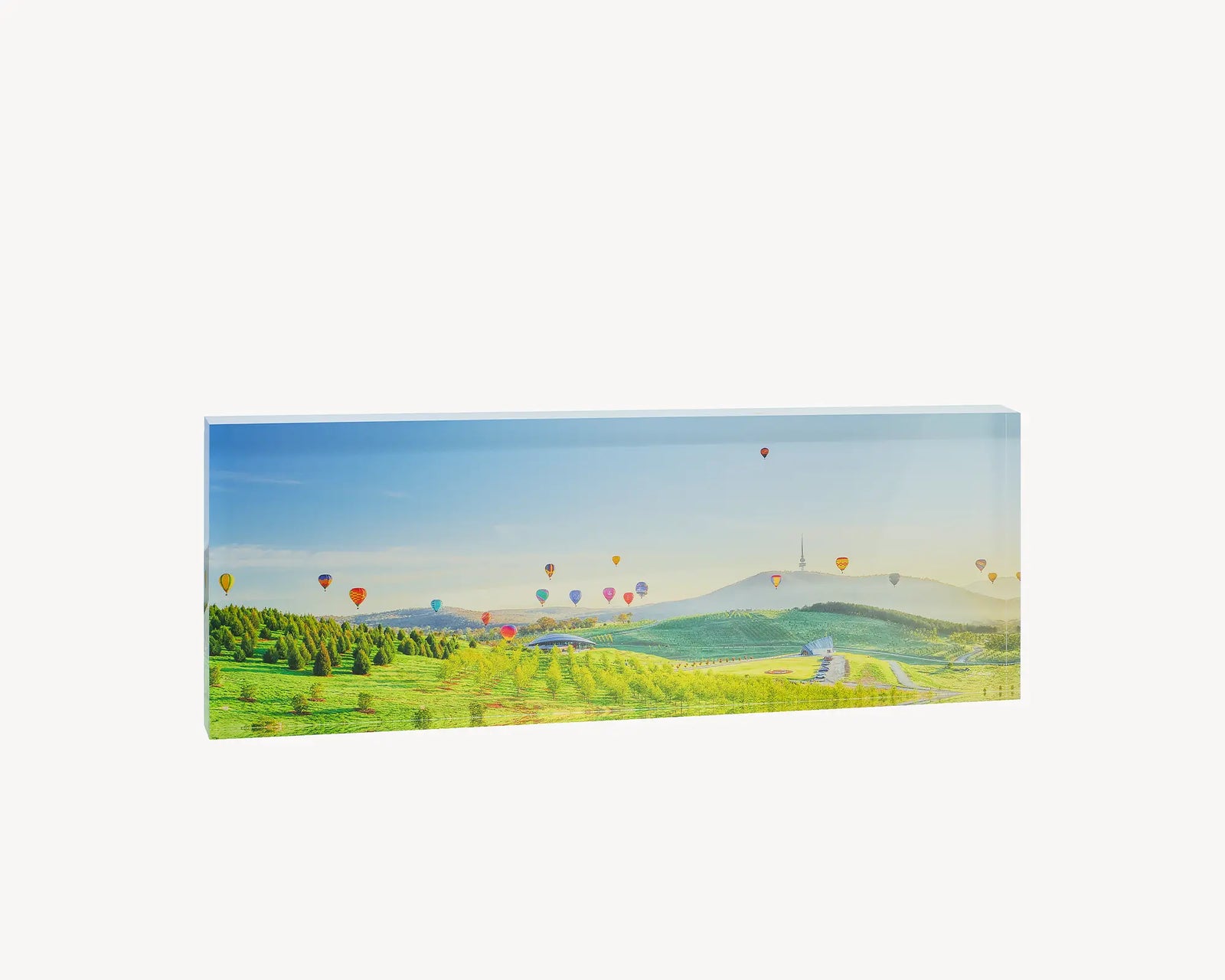 Enlighten. Acrylic block of hot air balloons at sunrise over the National Arboretum. Canberra artwork.