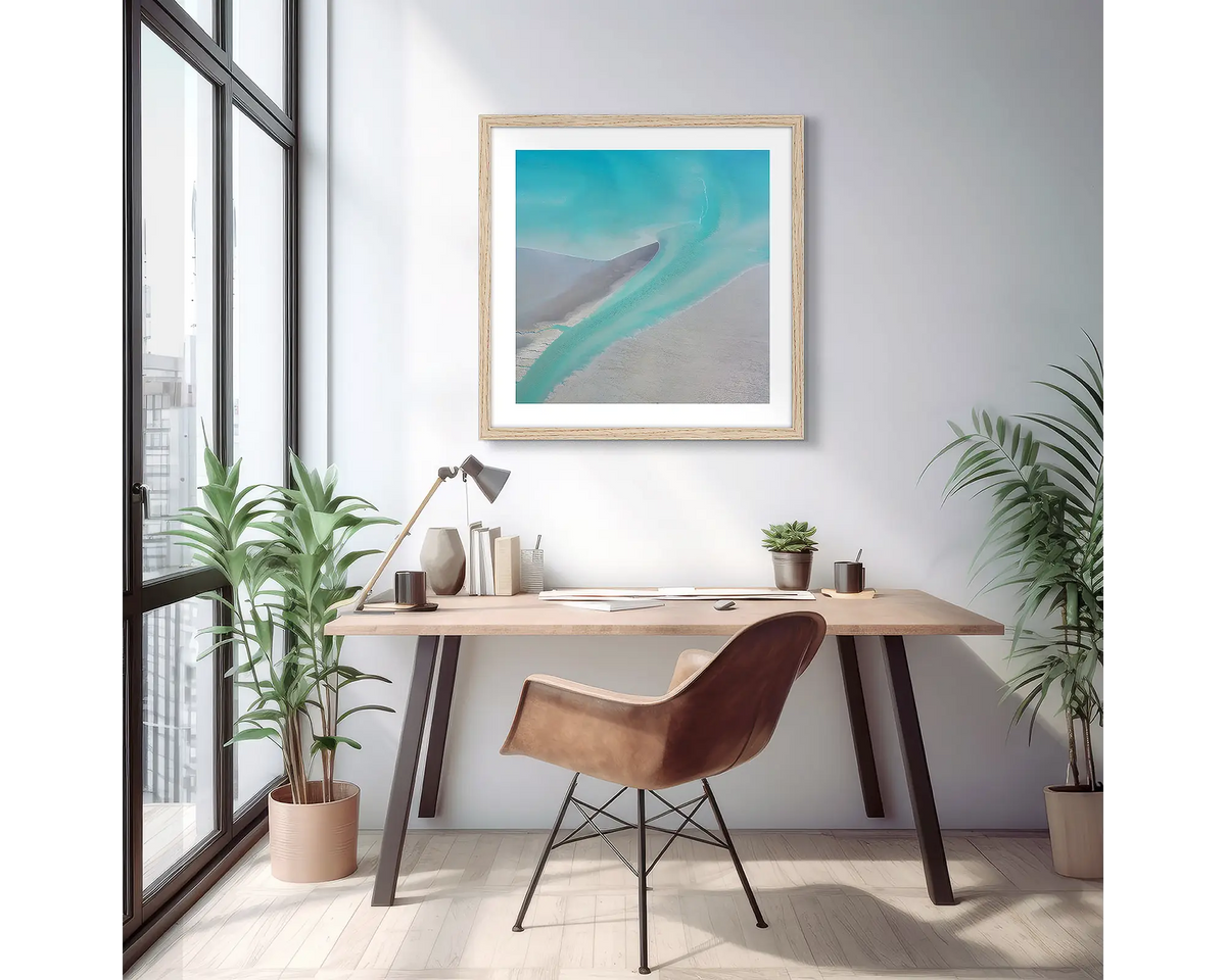 Entry. Abstract Kimberley wall art print, in a timber frame, hanging above a desk in an apartment. 