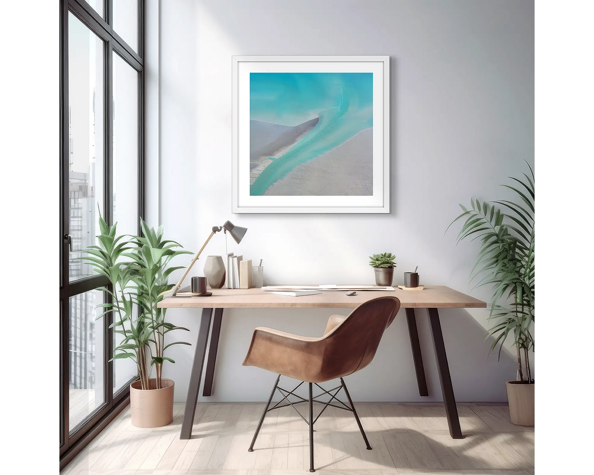 Entry. Abstract Kimberley wall art print, in a white frame, hanging above a desk in an apartment. 