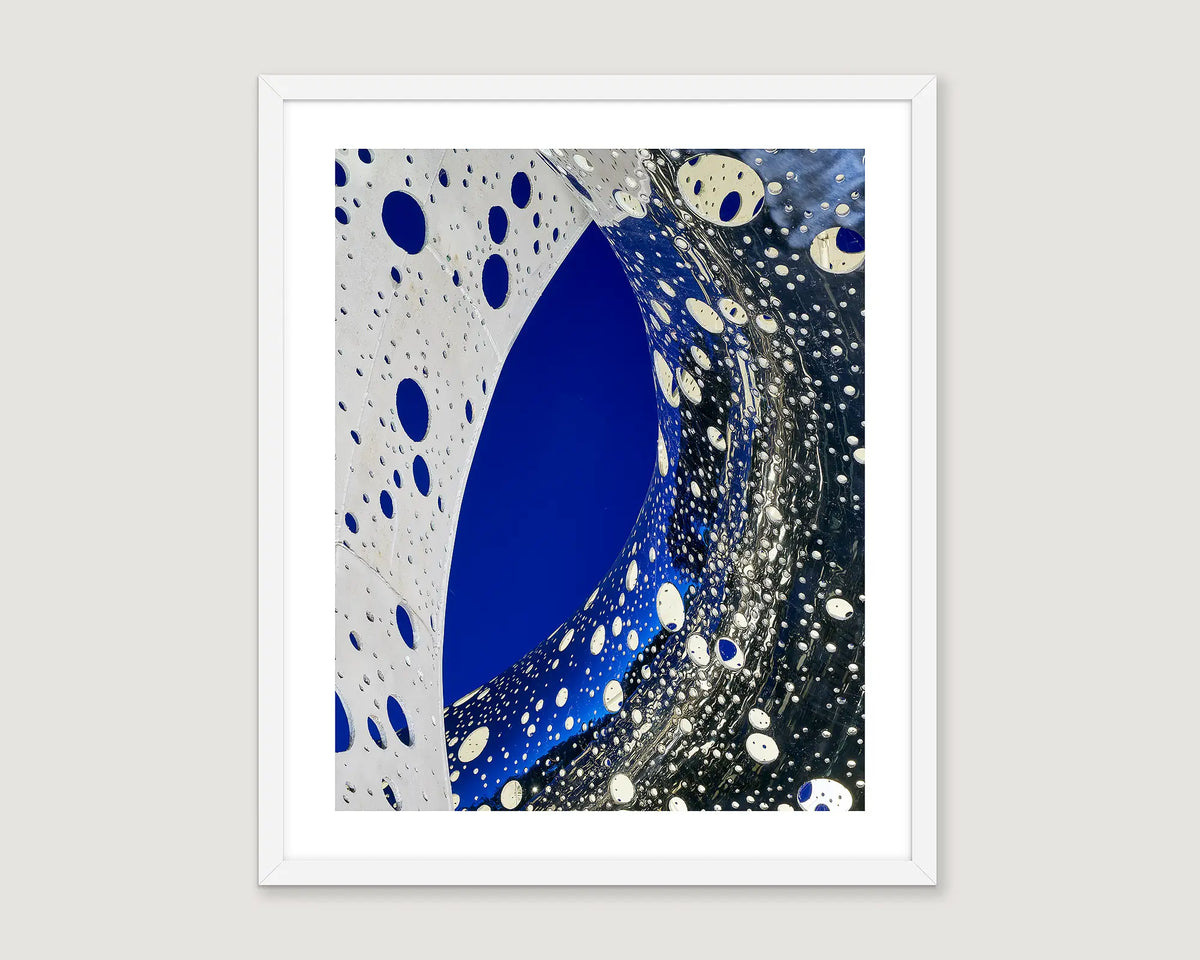 Framed abstract wall art print of Lindy Lee's Ouroboros sculpture at the National Gallery of Australia.