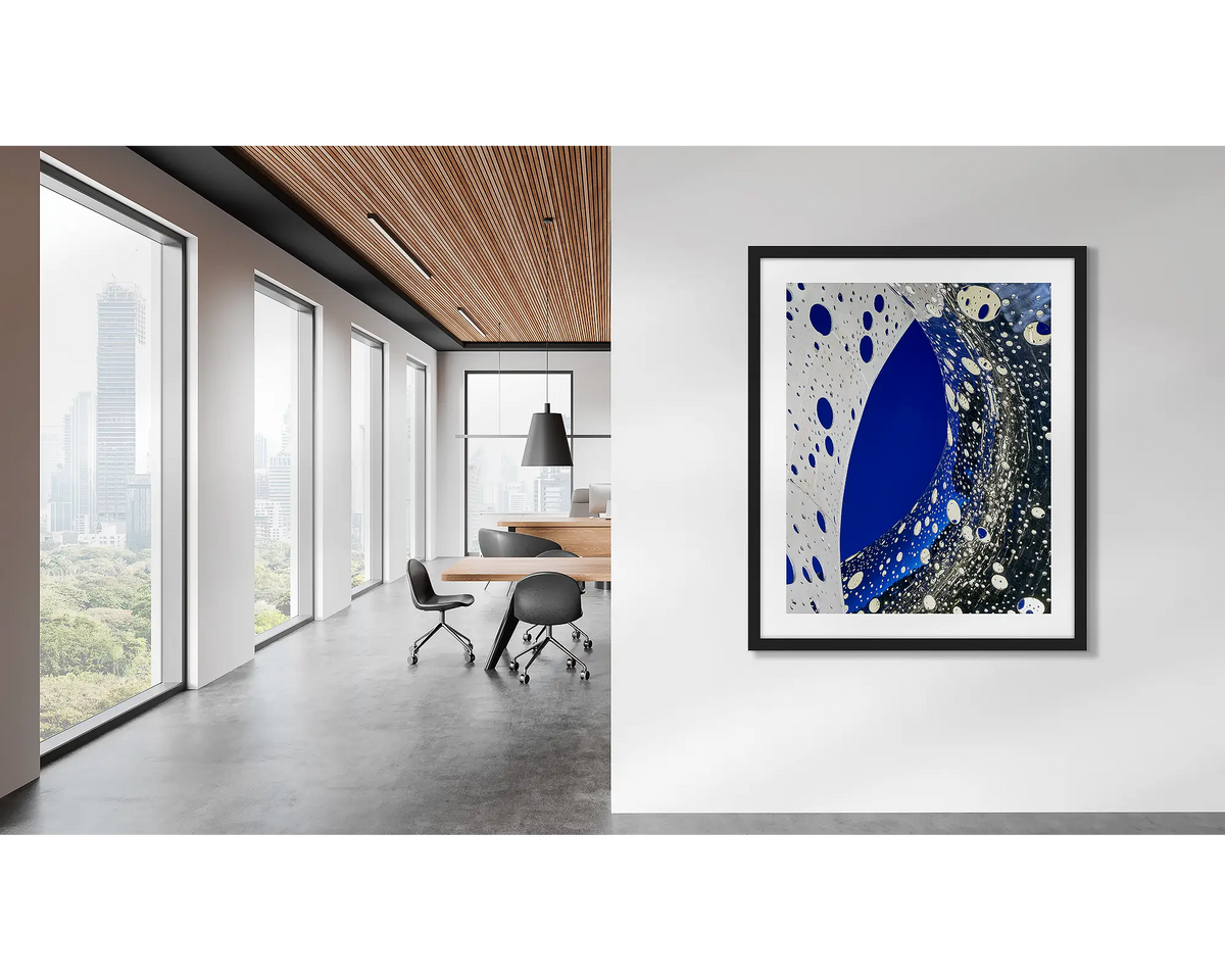 Entwine. Wall art print of the Ouroboros sculpture, framed in a black frame, and hung in a corporate office.  