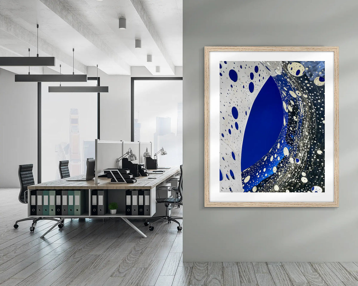 Entwine. Wall art print of the Ouroboros sculpture, framed in a Tasmanian Oak frame, and hung in a corporate office hallway. 