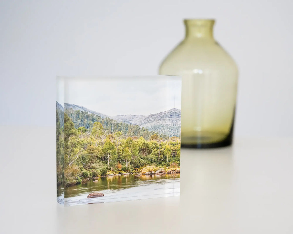 Escape to Nature. Acrylic block Thredbo River Kosciuszko National Park, sitting on desk styled with glassware.