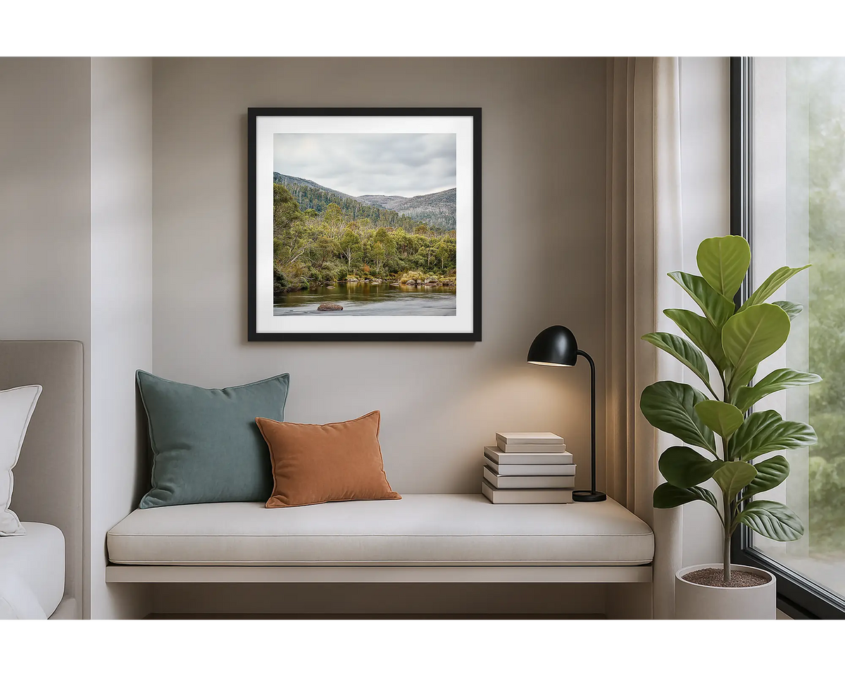 Escape to Nature. Framed wall art print of Thredbo River, Kosciuszko National Park,  with a black frame in an apartment. 