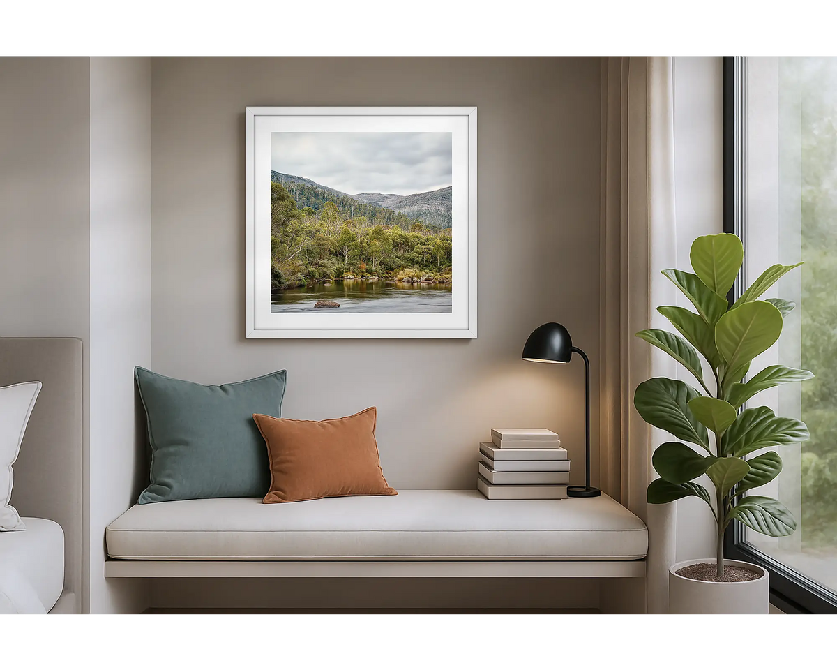 Escape to Nature. Framed wall art print of Thredbo River, Kosciuszko National Park,  with a white frame in an apartment. 