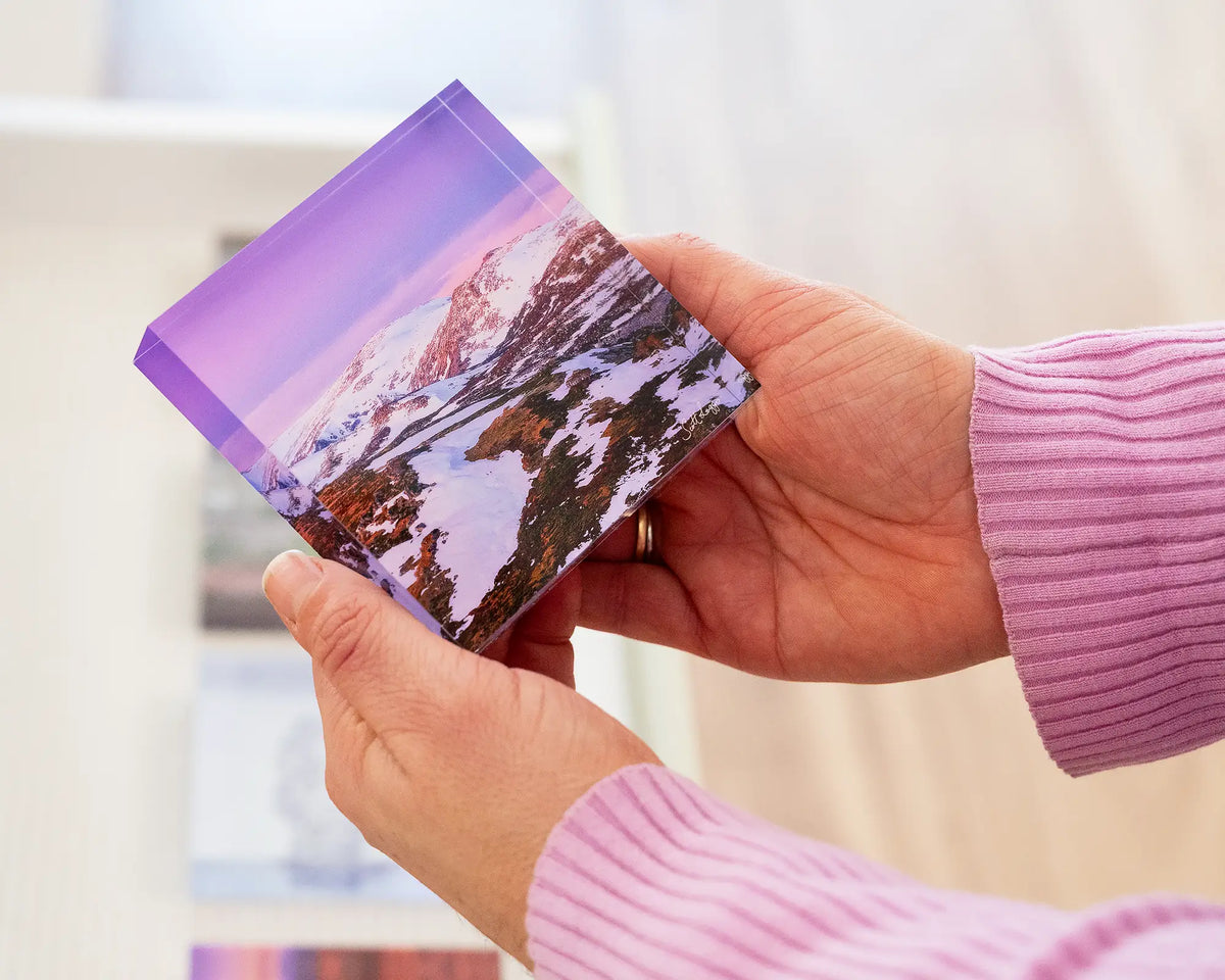 Escape To The Mountains. Acrylic block of sunset over Kosciuszko National Park, held in hands.