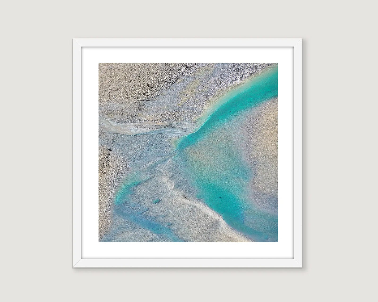 Framed photographic aerial view of the tidal patterns of Roebuck Bay, the Kimberley. 