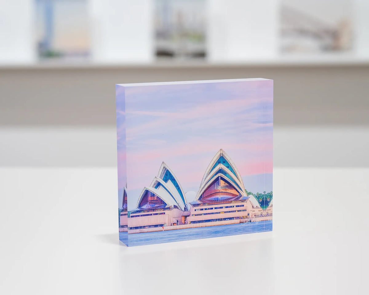 Evening At The Opera. Acrylic block of Sydney Opera House at sunset, on gallery desk.