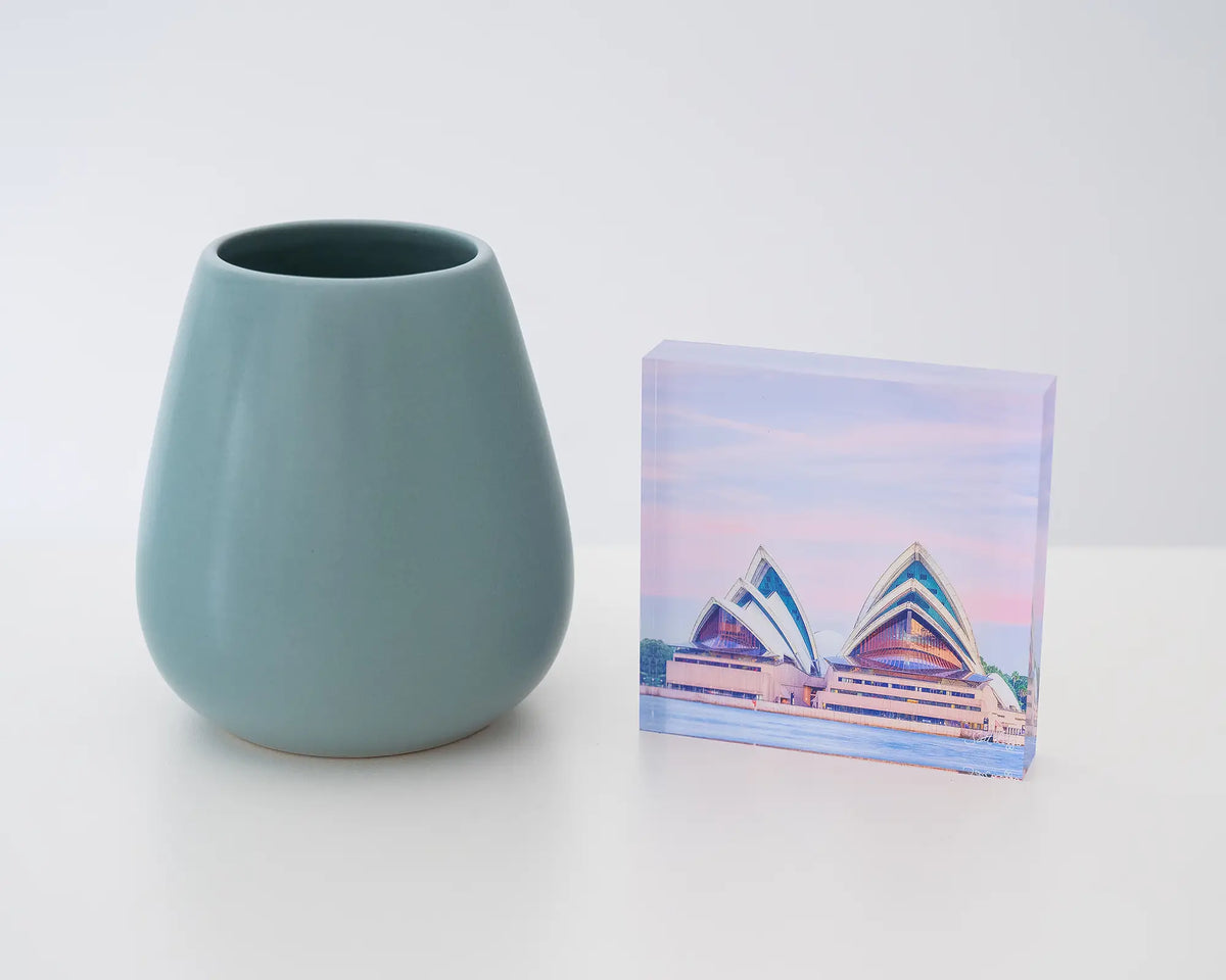 Evening At The Opera. Acrylic block of Sydney Opera House at sunset, styled with a small vase.