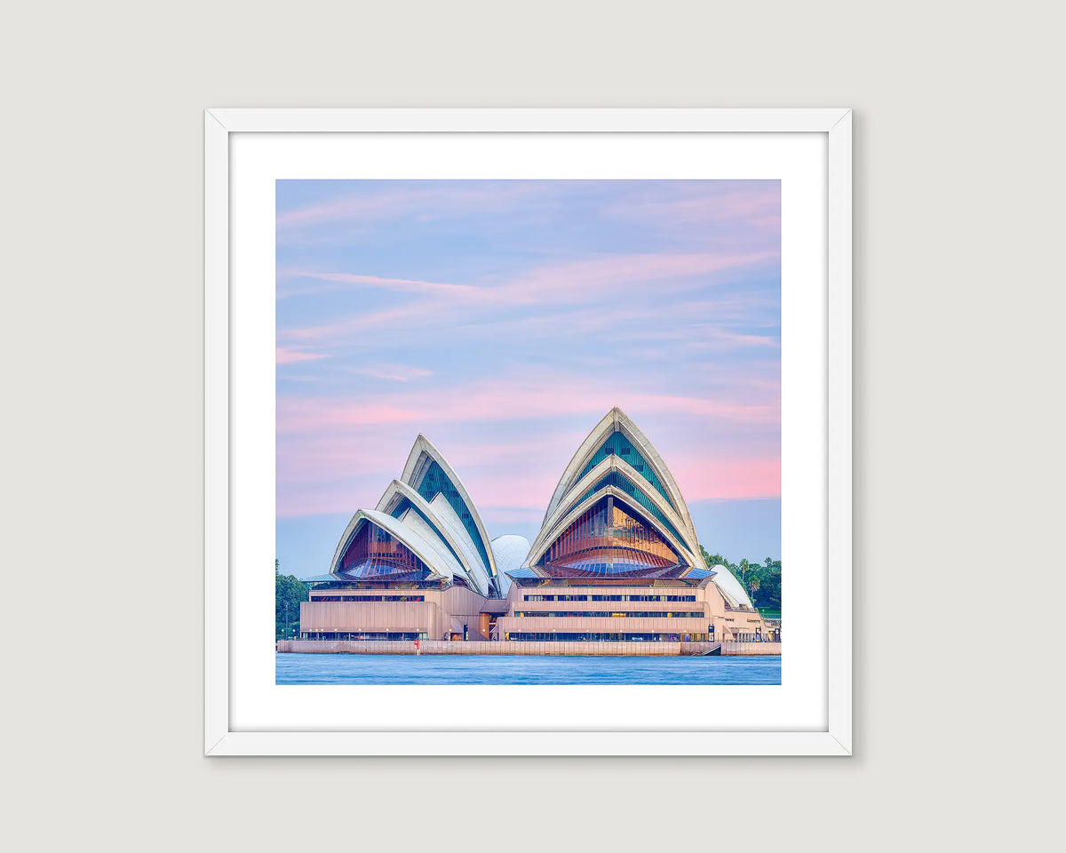 Framed photographic print of a sunset above Sydney Opera House. 