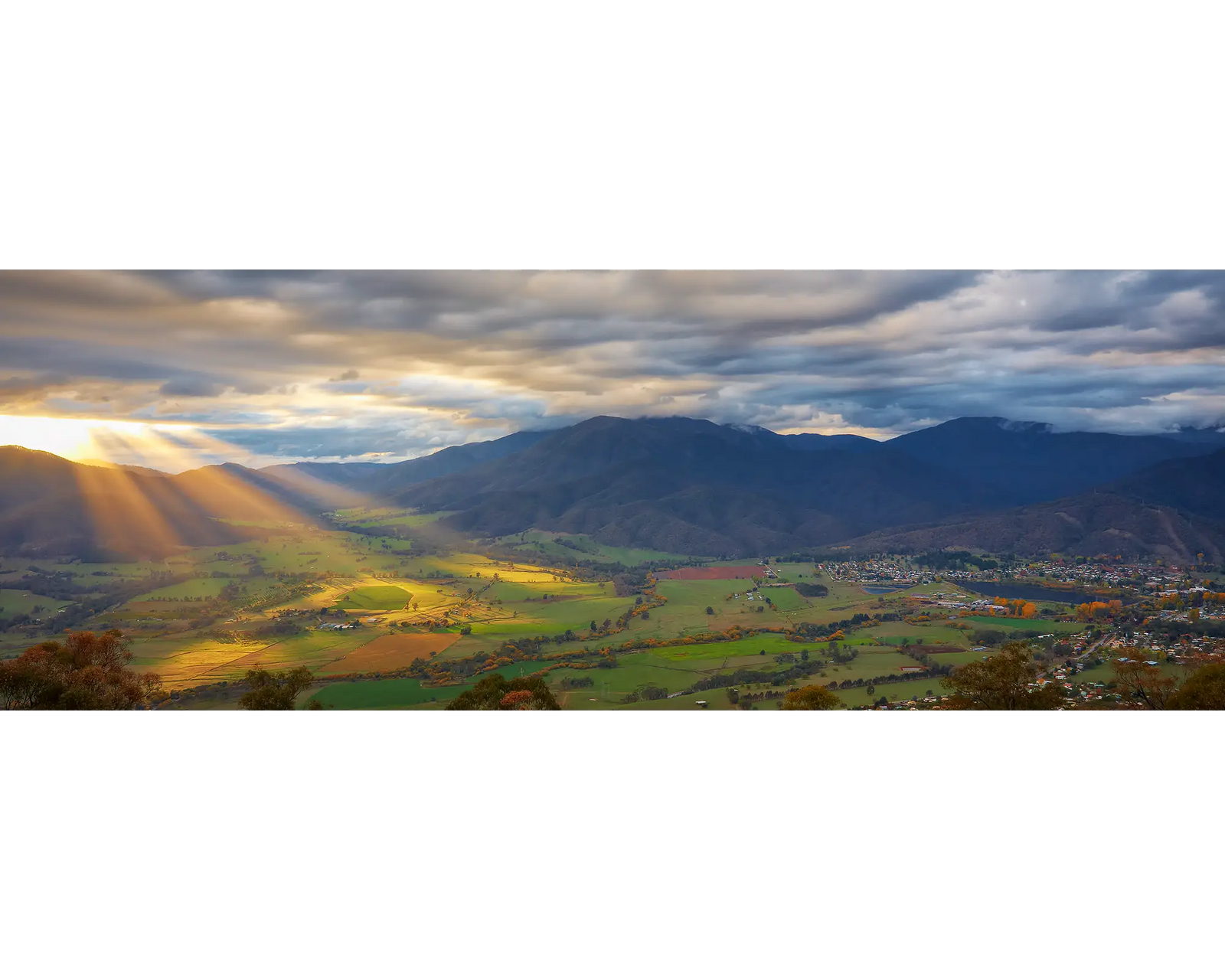 Rays of light shining down on Mount Beauty and surrounds. 