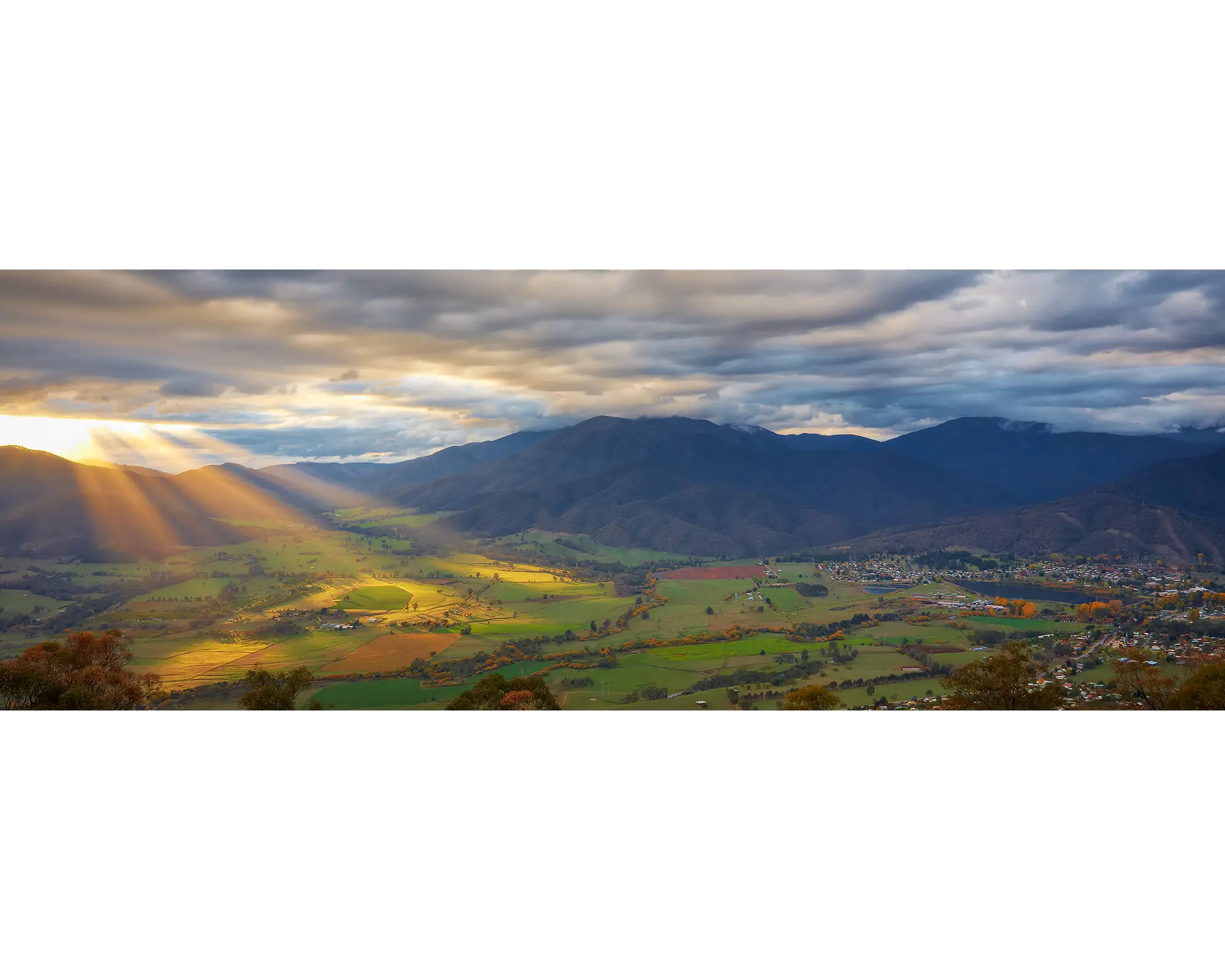 Rays of light shining down on Mount Beauty and surrounds. 