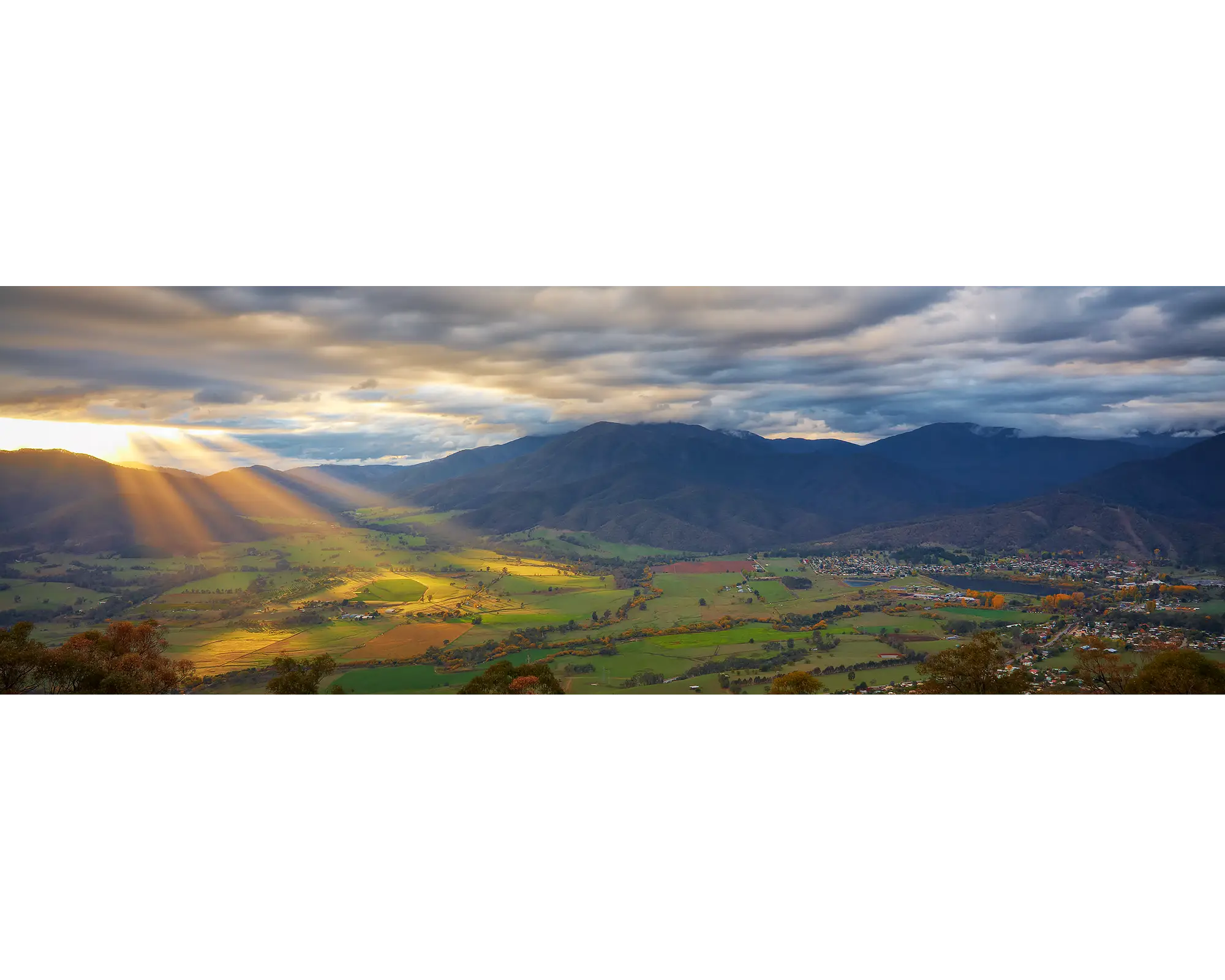 Fingers Of Light - Sun rays over Mount Beauty, Victoria.