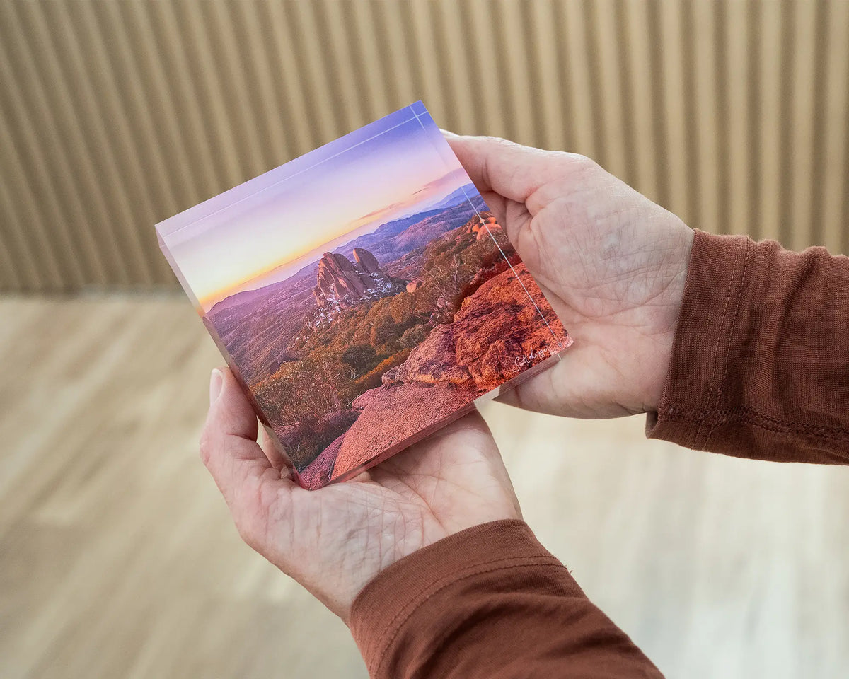 First Snow. Acrylic block of the Cathedral Mount Buffalo National Park, being hand held.